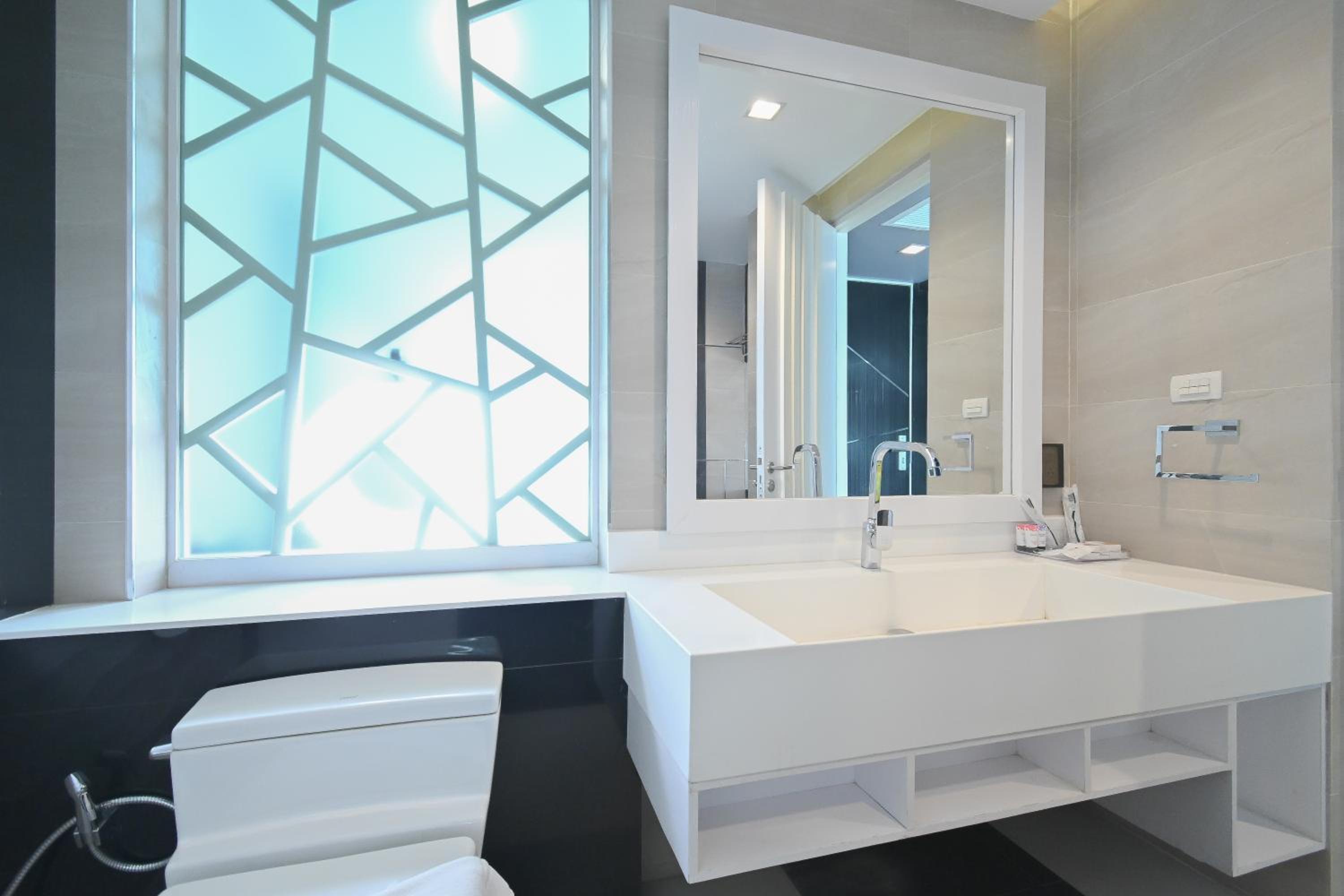 Deluxe Triple Room - Photo 11
