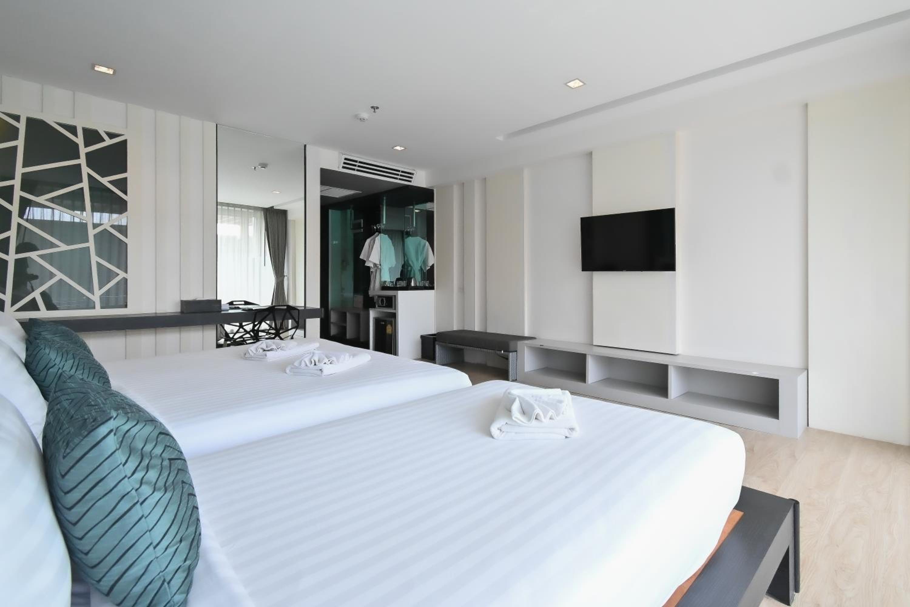 Deluxe Triple Room - Photo 21