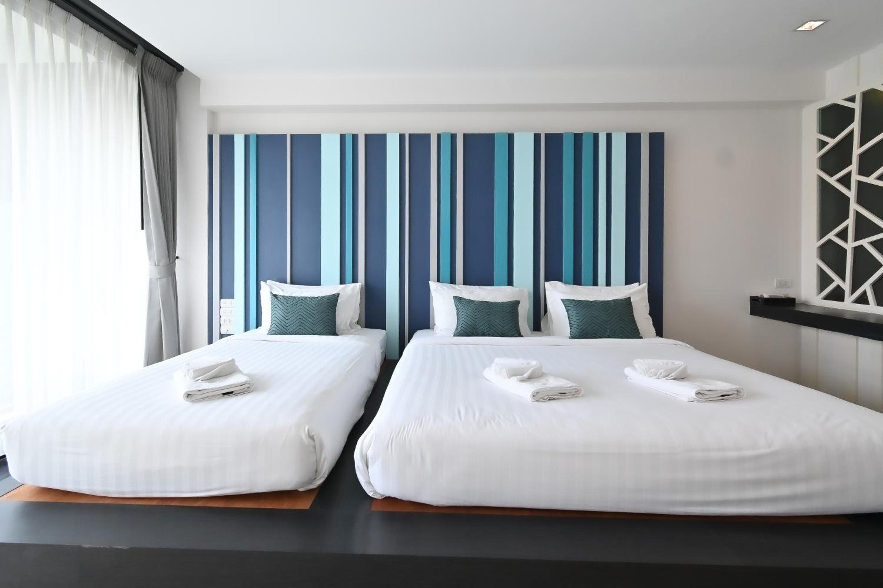 Deluxe Triple Room - Photo 18