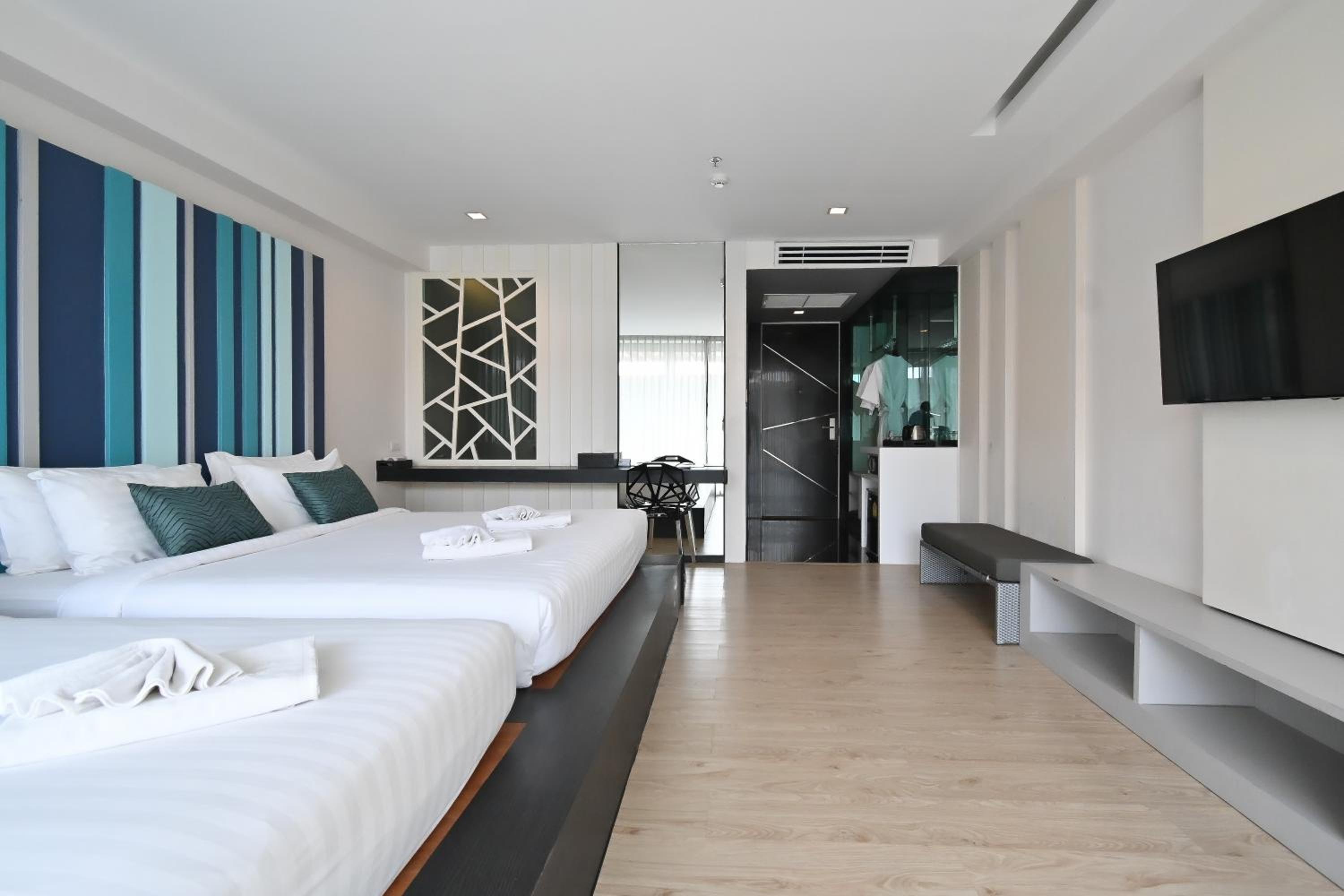 Deluxe Triple Room - Photo 15