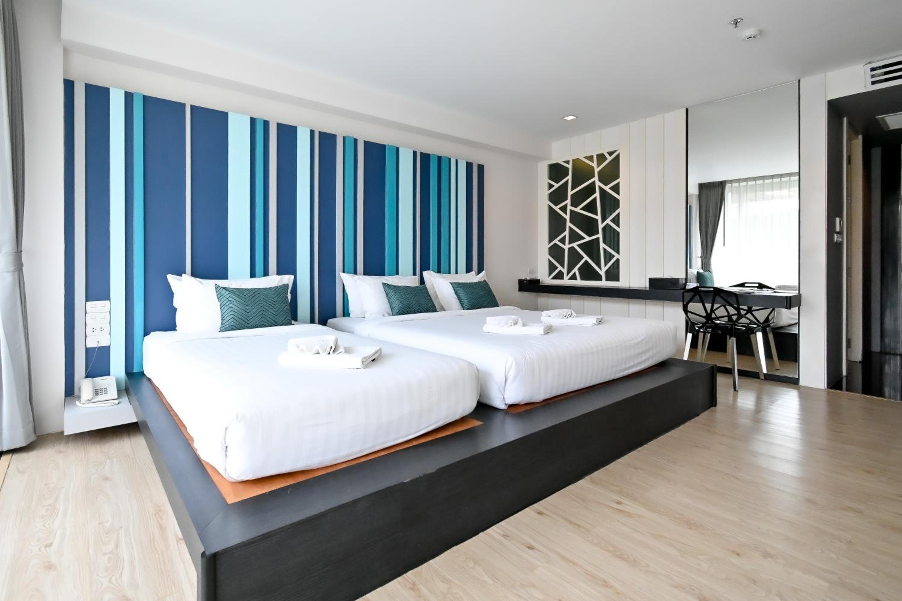 Deluxe Triple Room - Photo 20