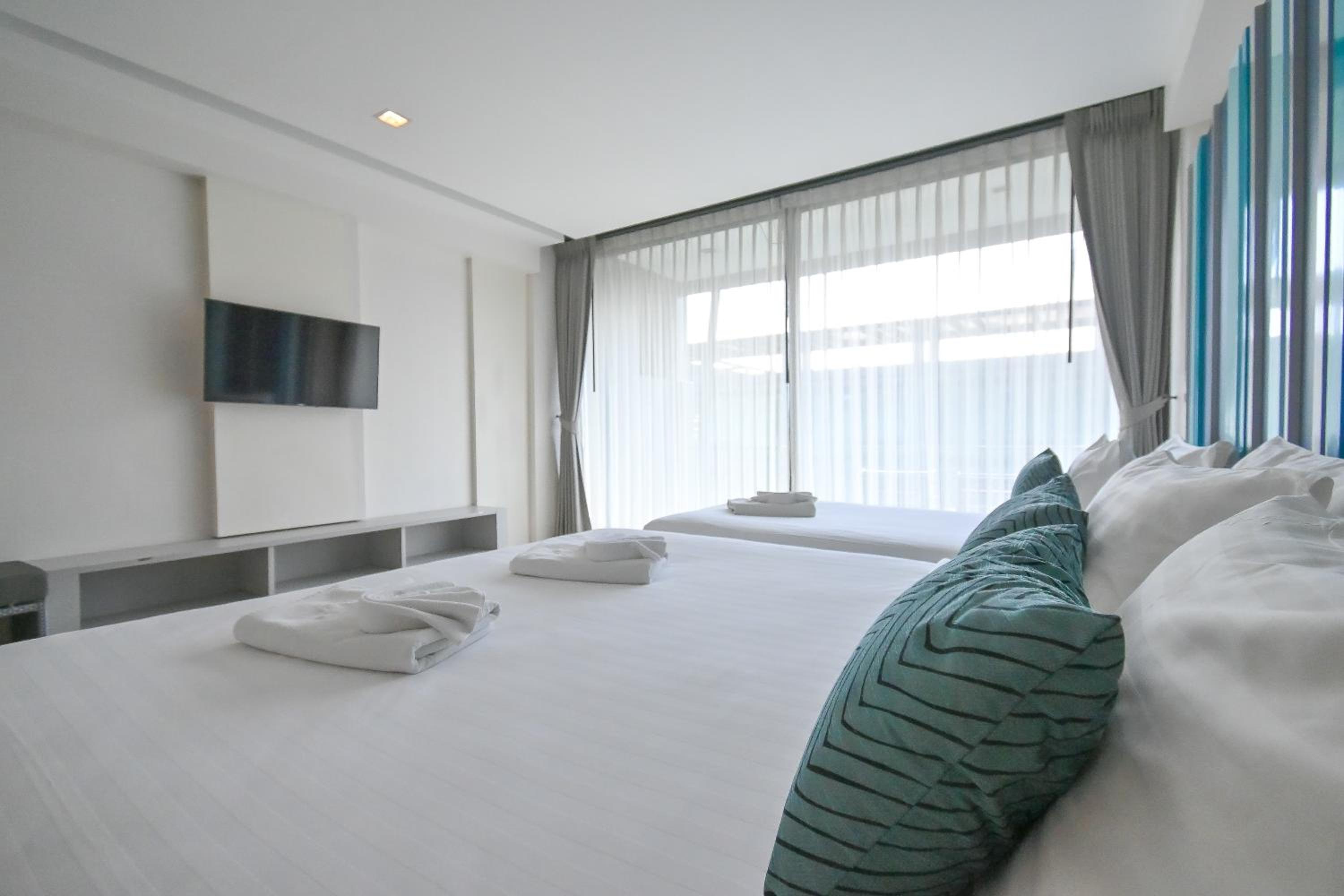 Deluxe Triple Room - Photo 19