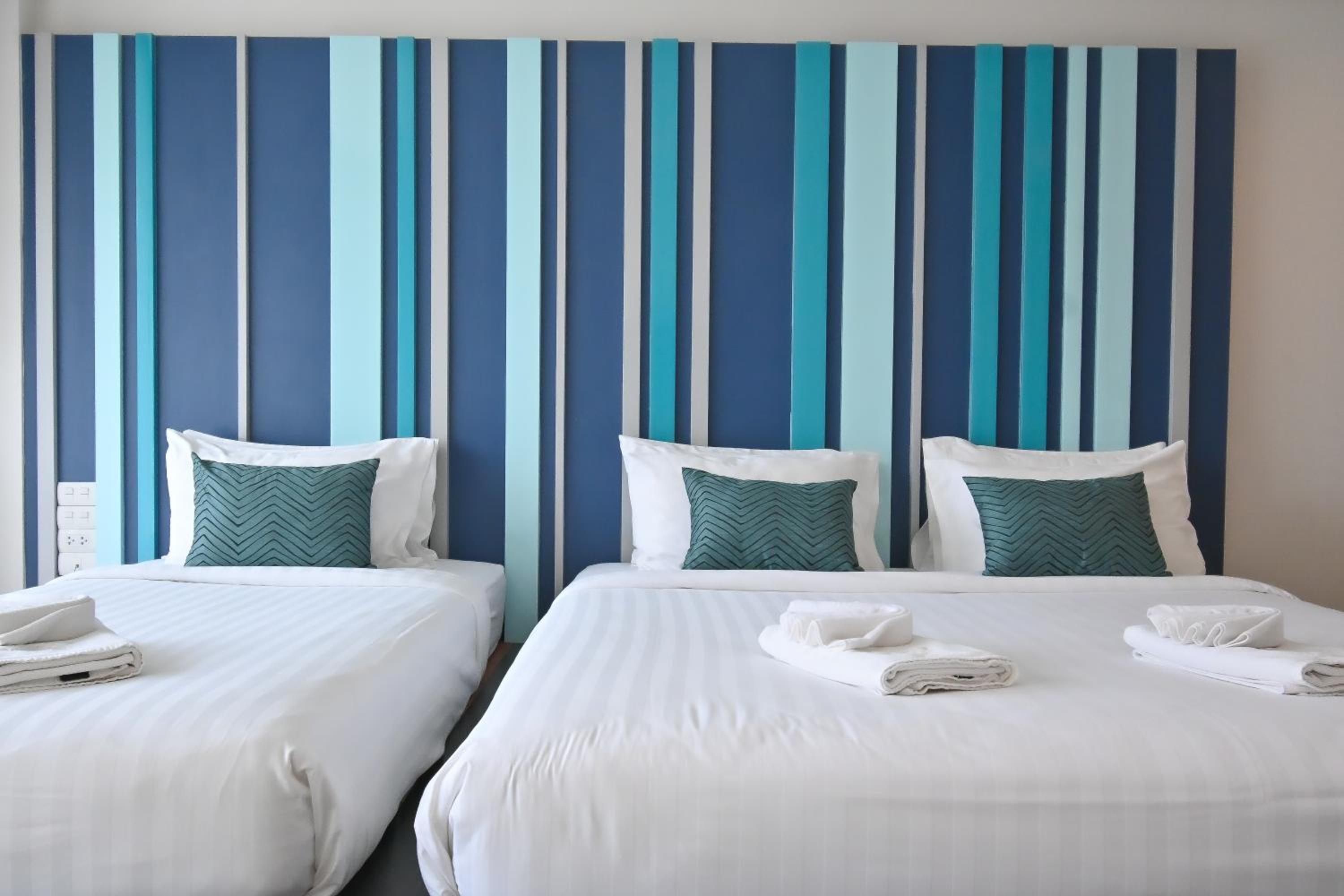 Deluxe Triple Room - Photo 16