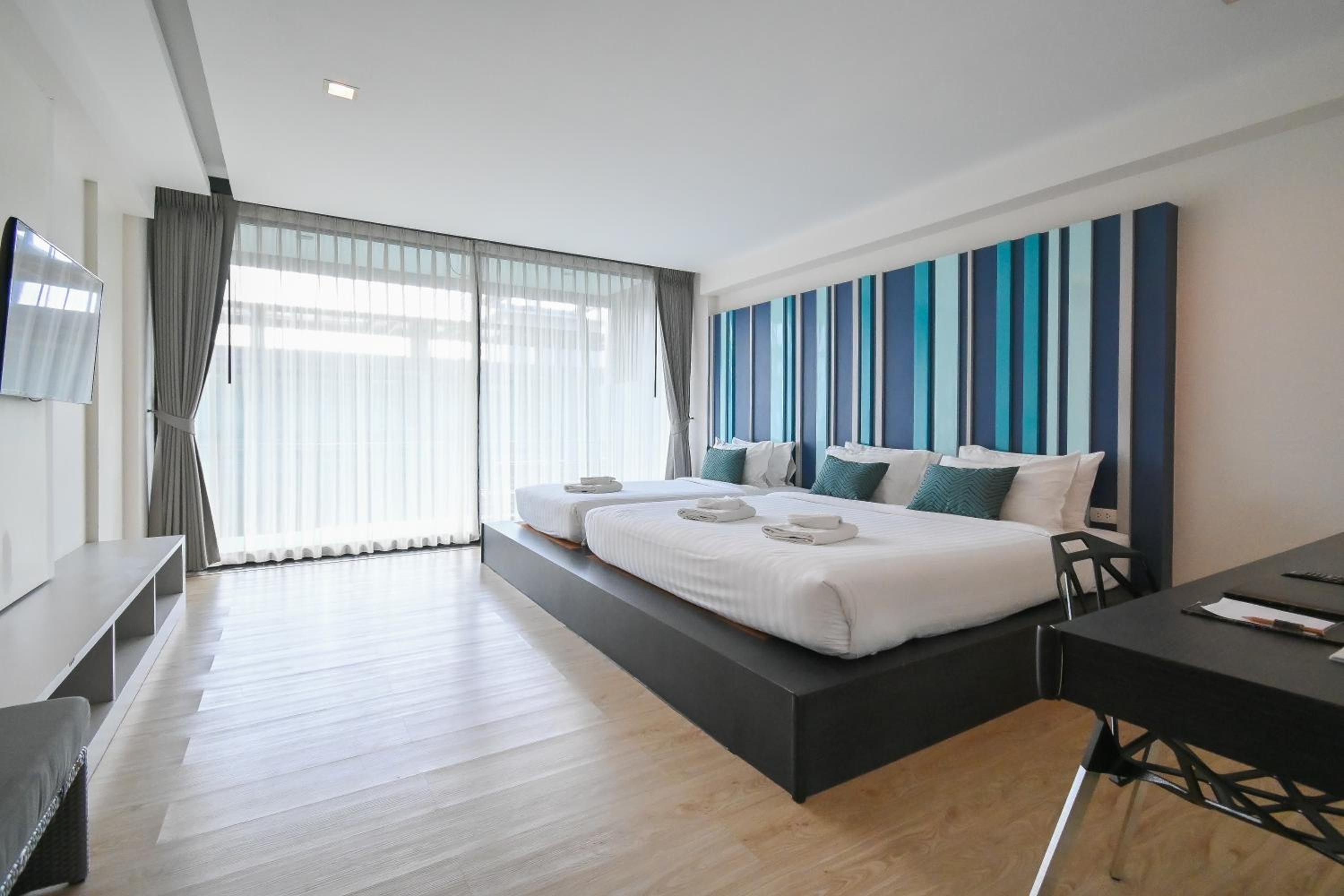 Deluxe Triple Room - Photo 17