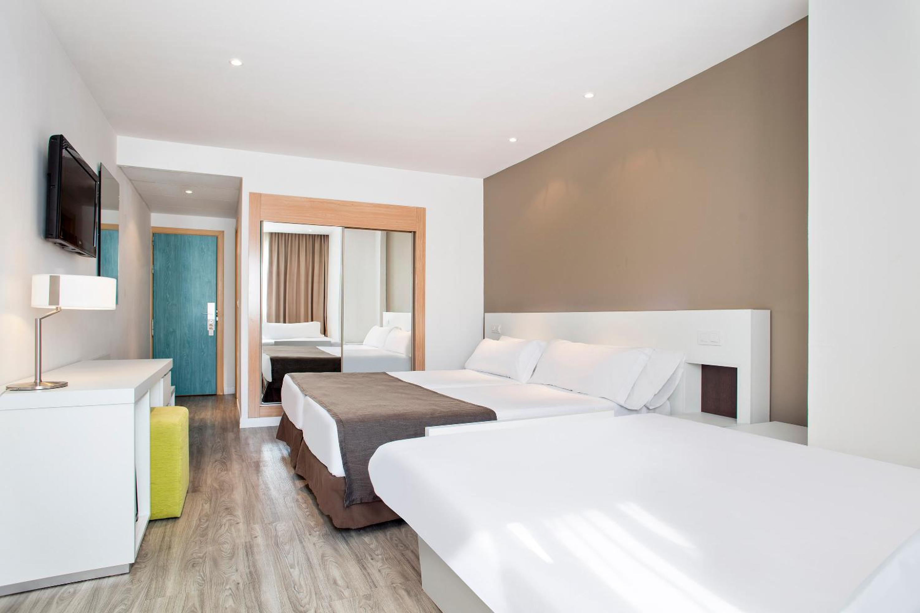 Relax in comfort and style at our cozy hotel room.