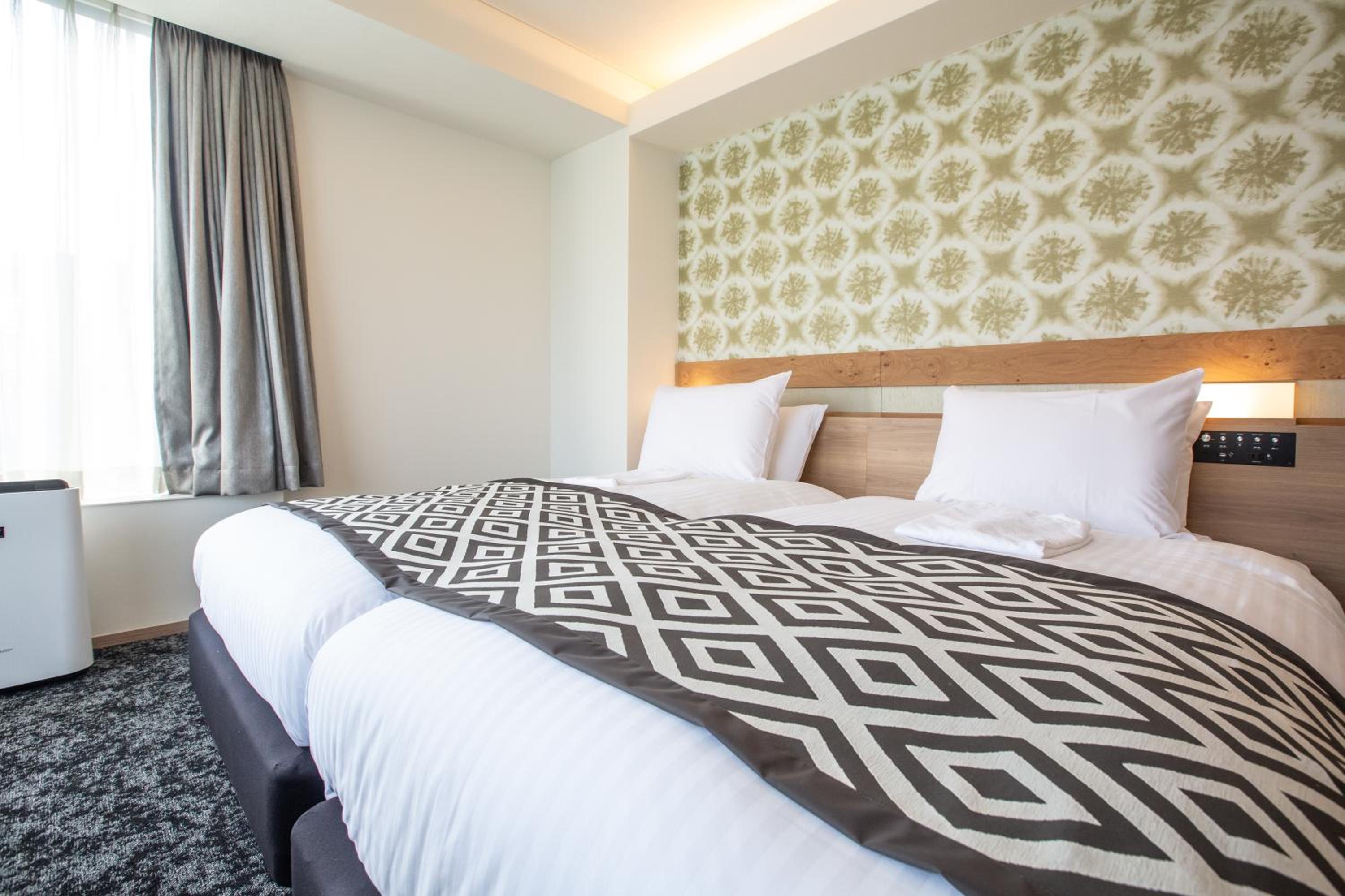 Deluxe Twin Room with Sofa bed photo 3