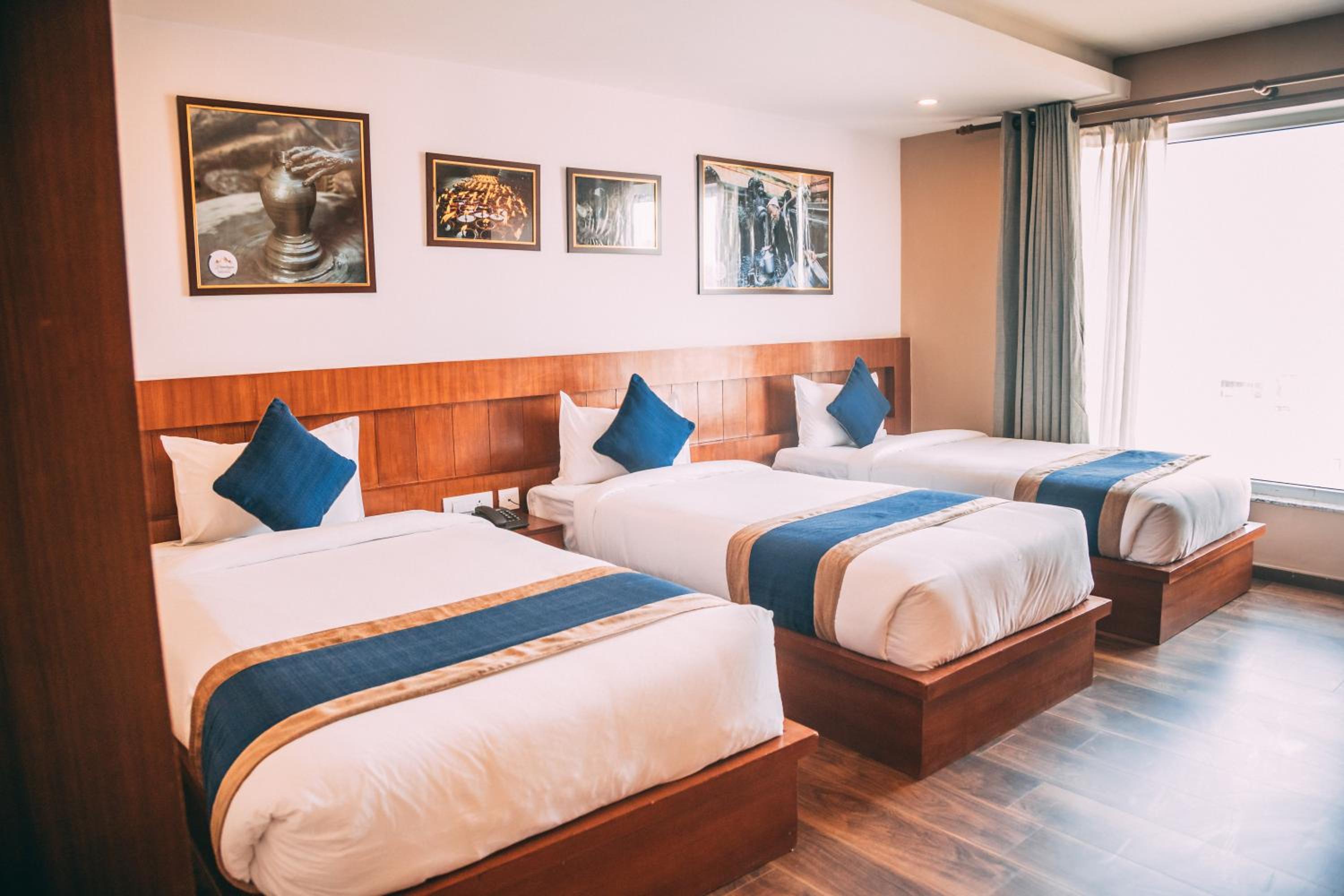 Deluxe Triple Room - Photo 9