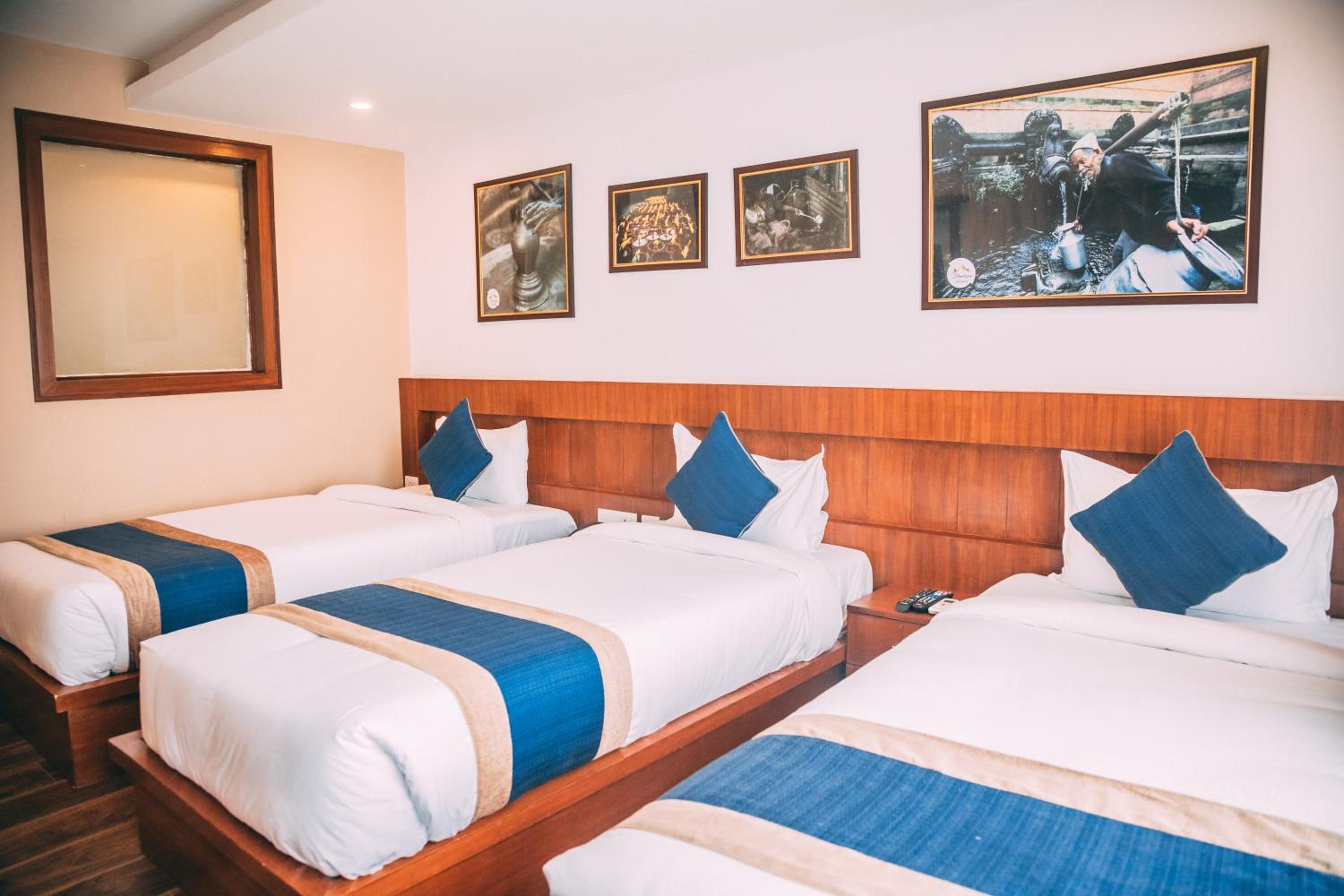 Deluxe Triple Room - Photo 15