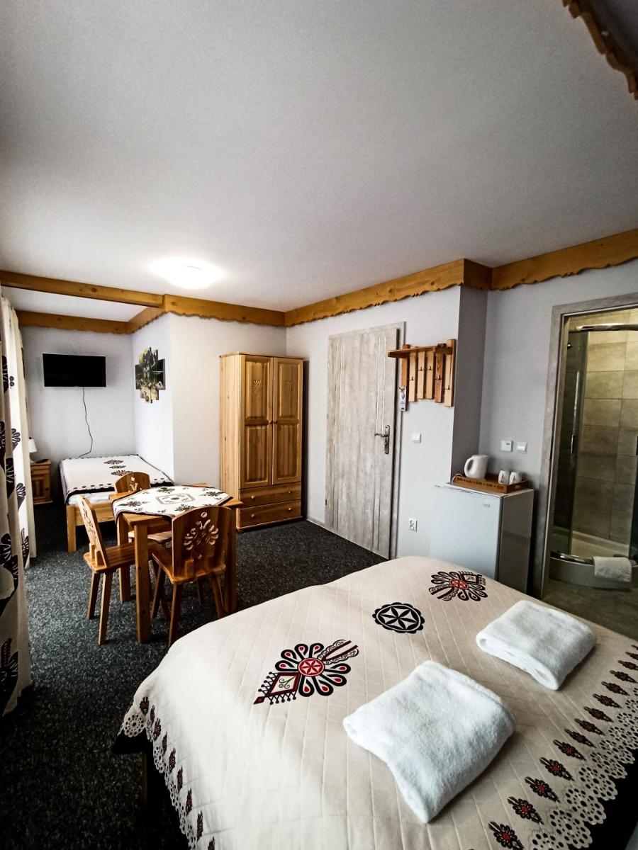 Deluxe Triple Room - Photo 8