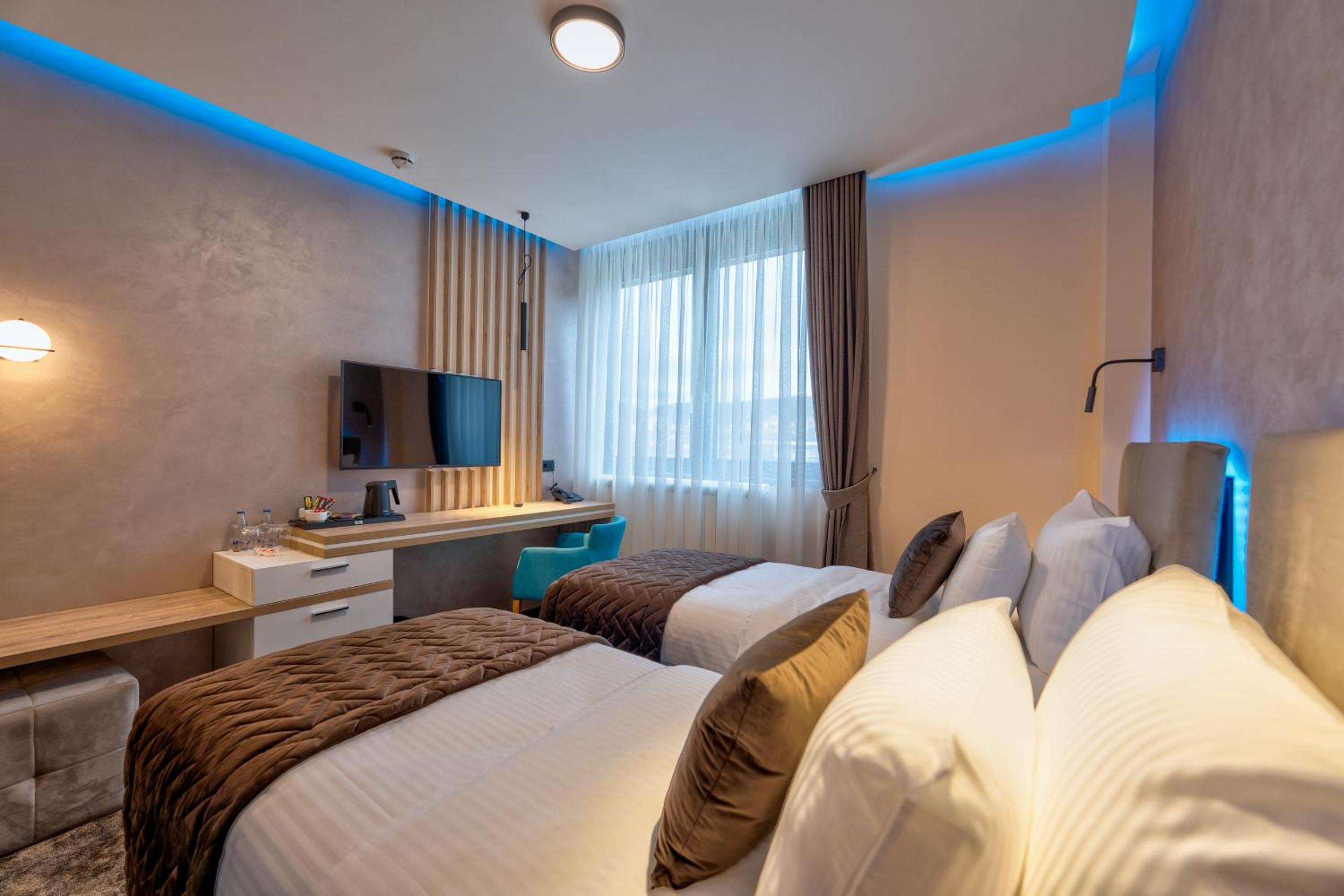 Standard Twin Room - Photo 7