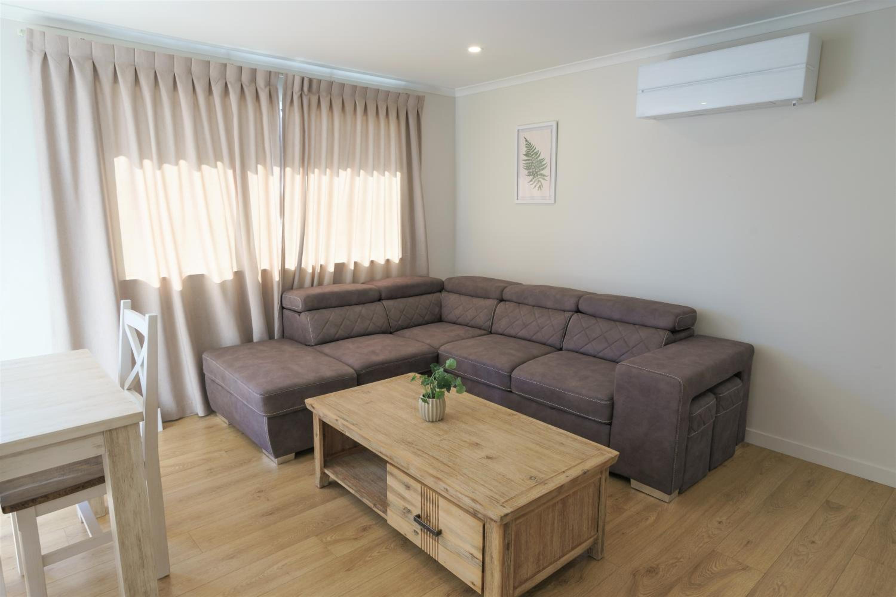 Three-Bedroom Apartment - Photo 11