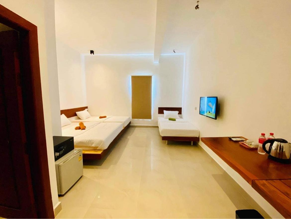 Quadruple Room with Private Bathroom - Photo 1