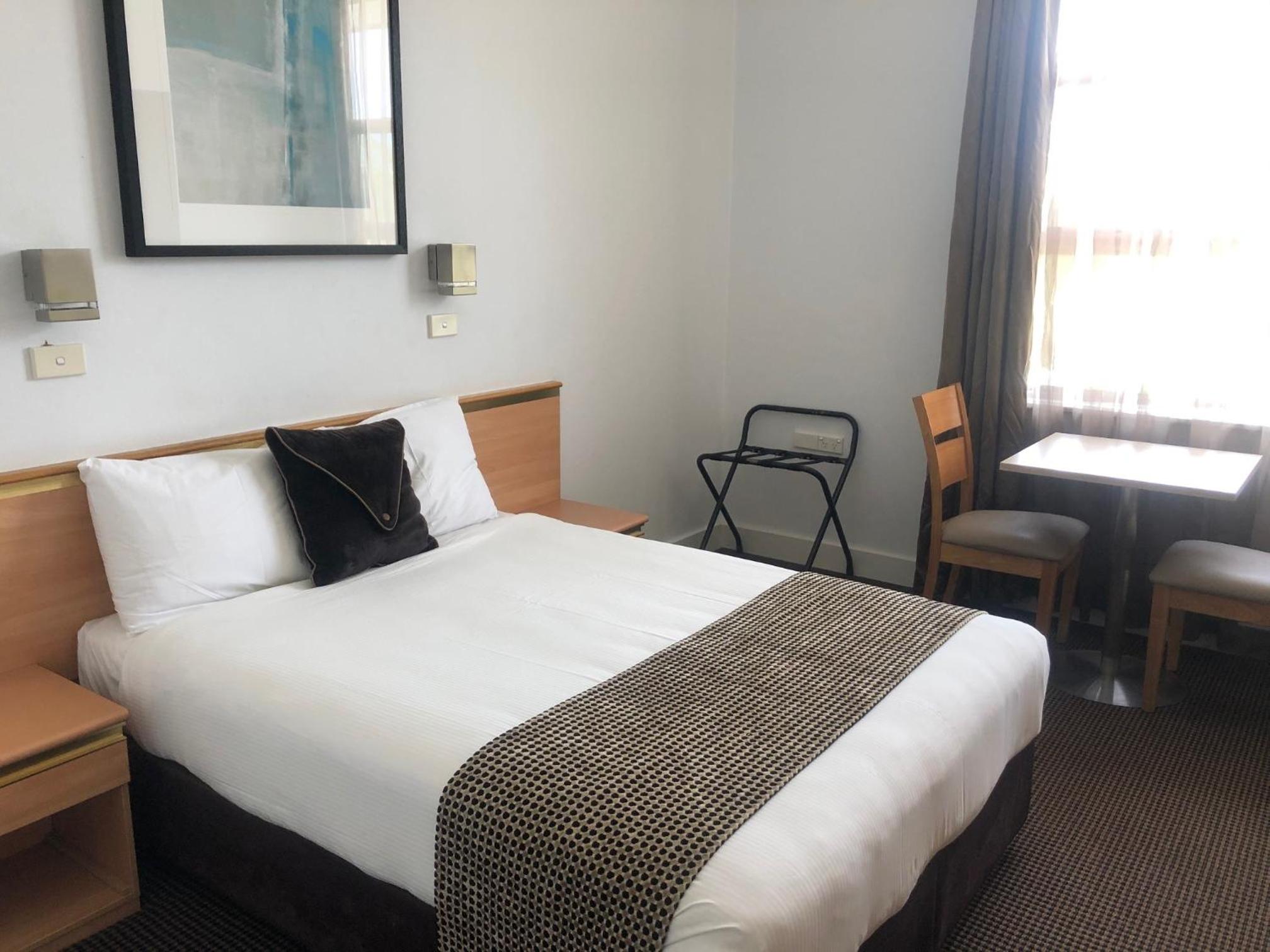 Queen Room with Shared Bathroom