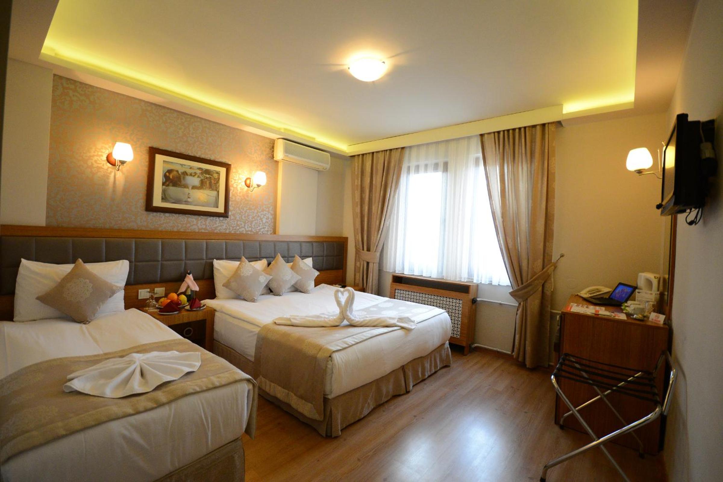 Standard Twin Room - Photo 7