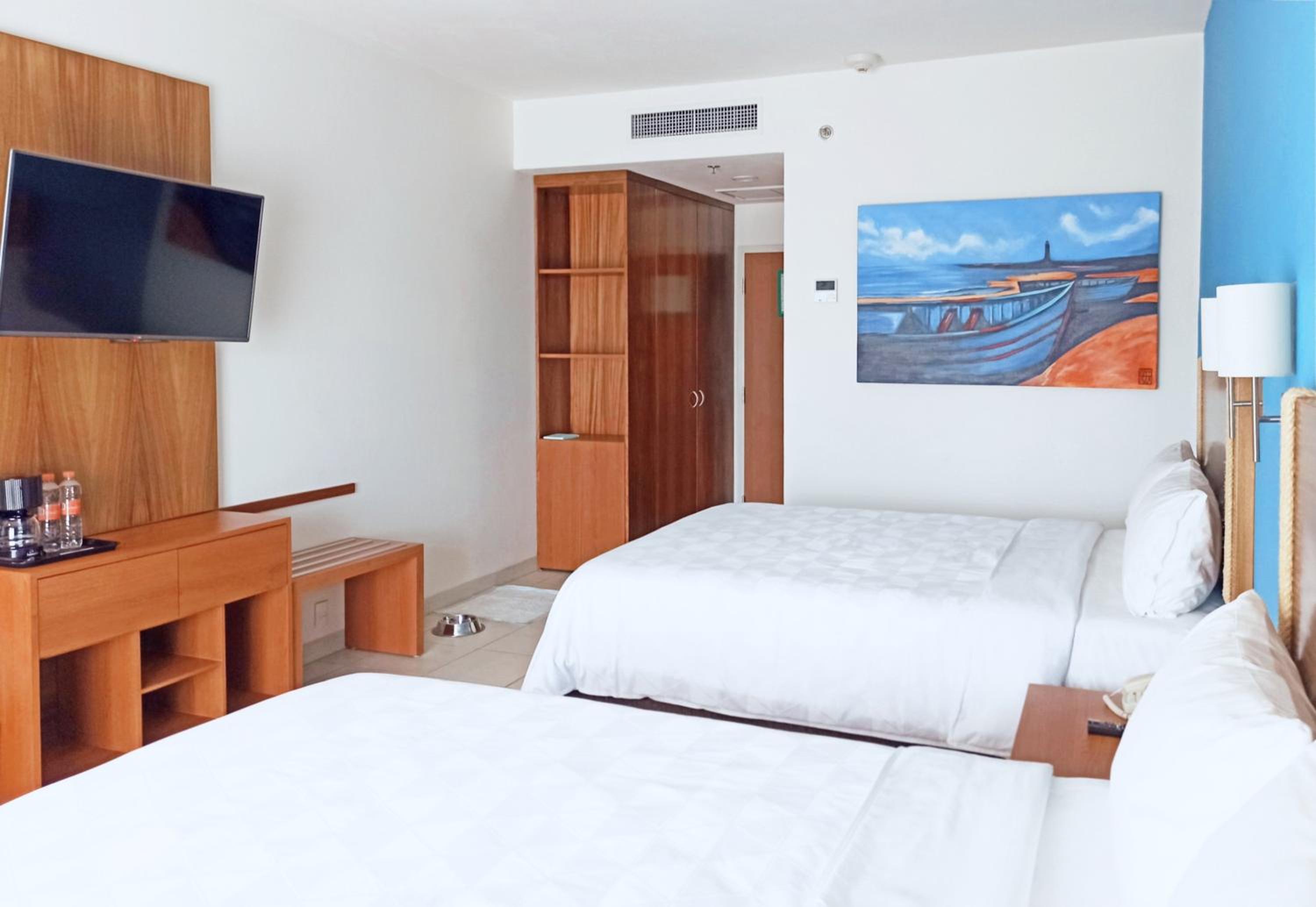 Standard Queen Room with Two Queen Beds - Pet Friendly photo 1