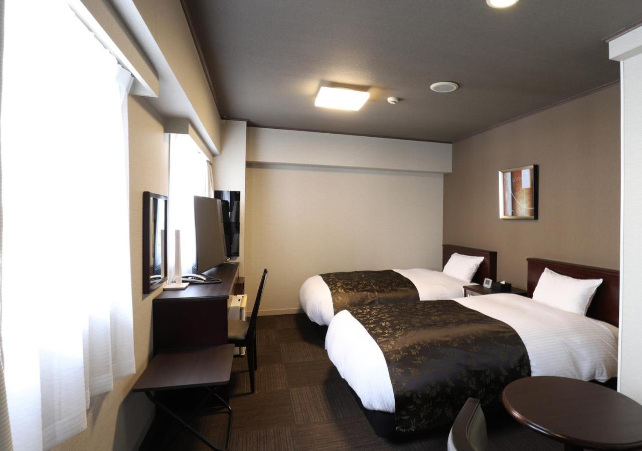 Twin Room - Photo 11