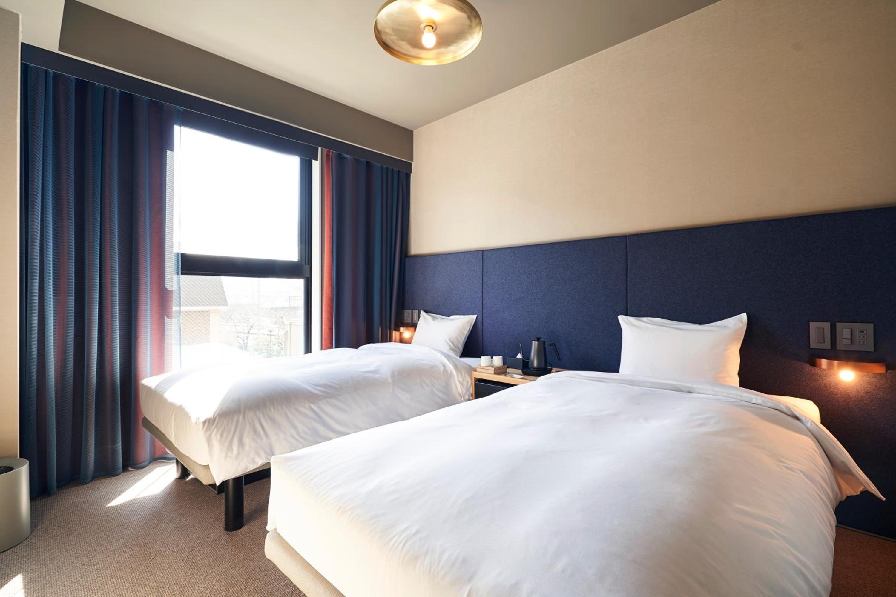 Standard Twin Room - Photo 7