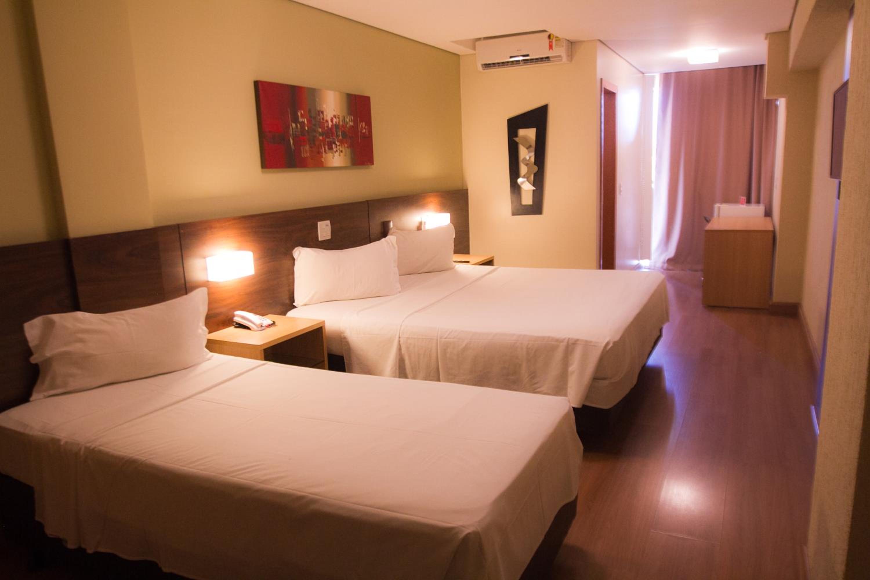 Deluxe Queen Room with 1 Queen and 2 Single Beds