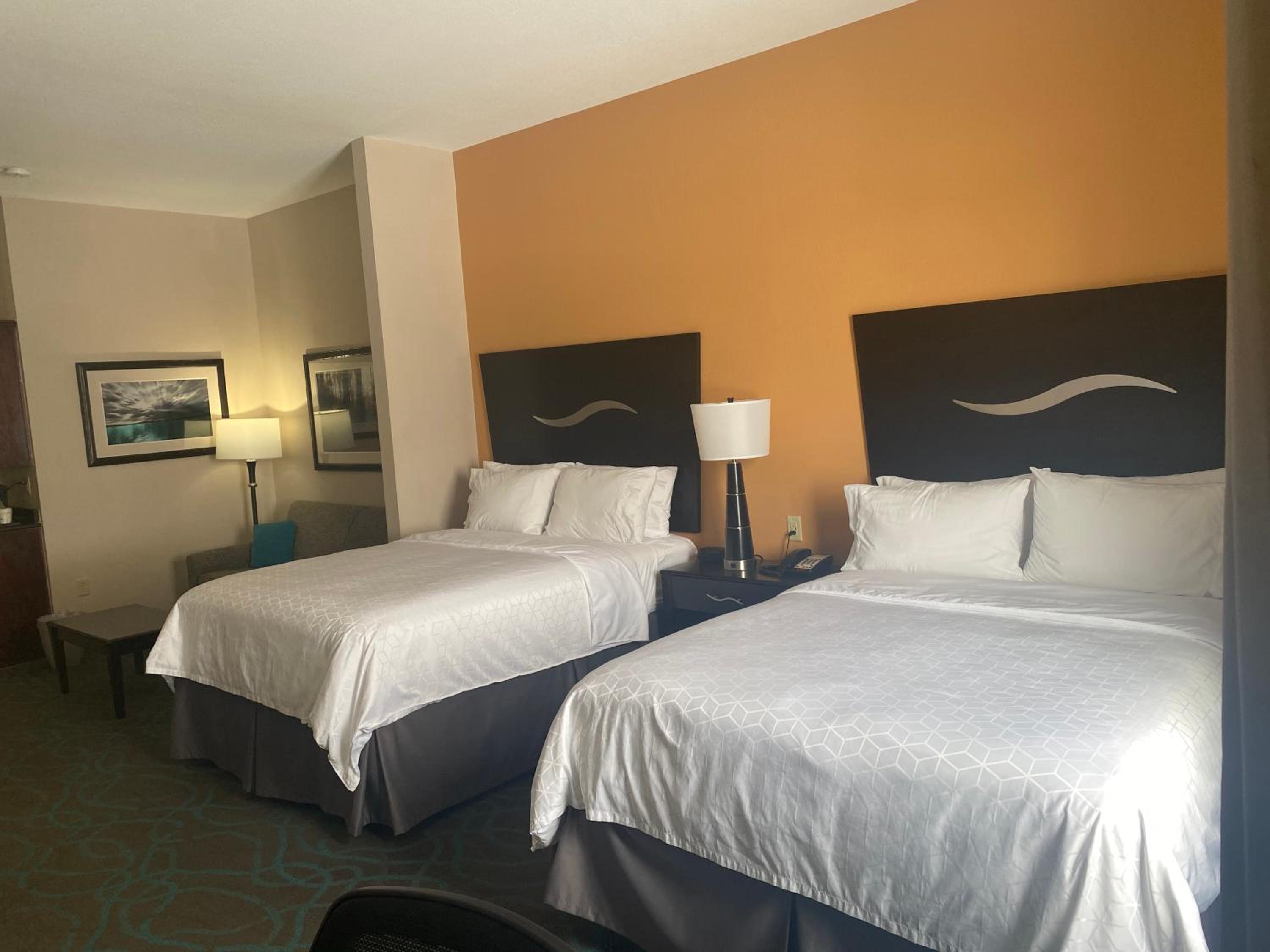 Queen Suite With Two Queen Beds And Additional Living Area - Photo 1