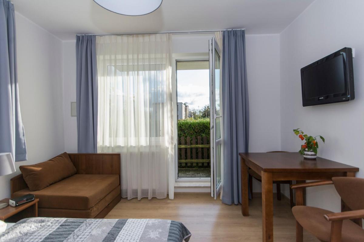 Double Room with Balcony (2 Adults + 1 Child) photo 2
