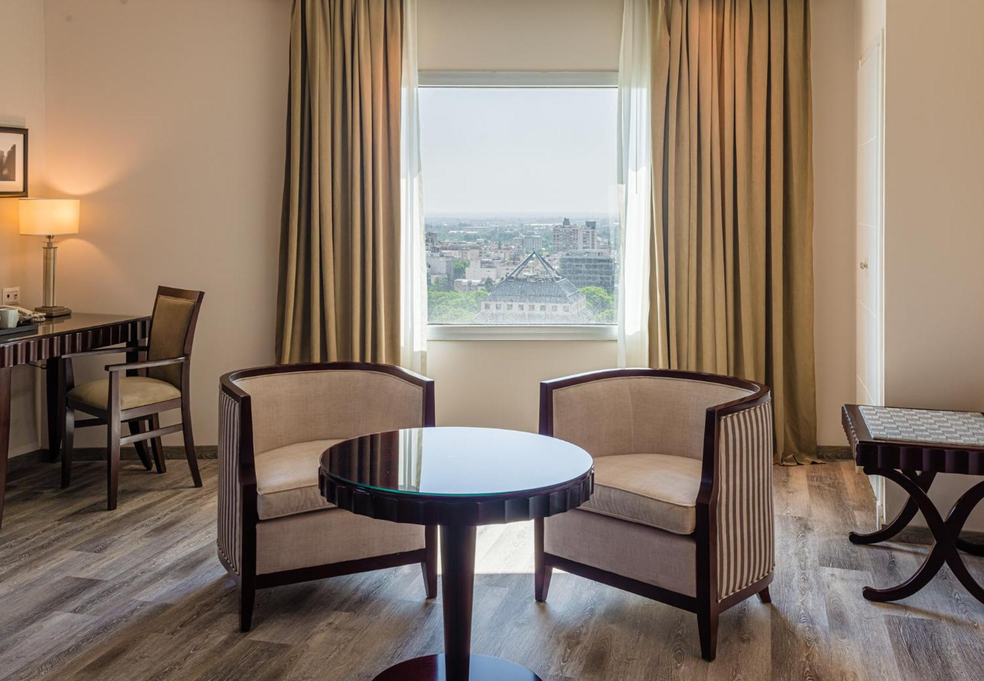 Corner Room with City View