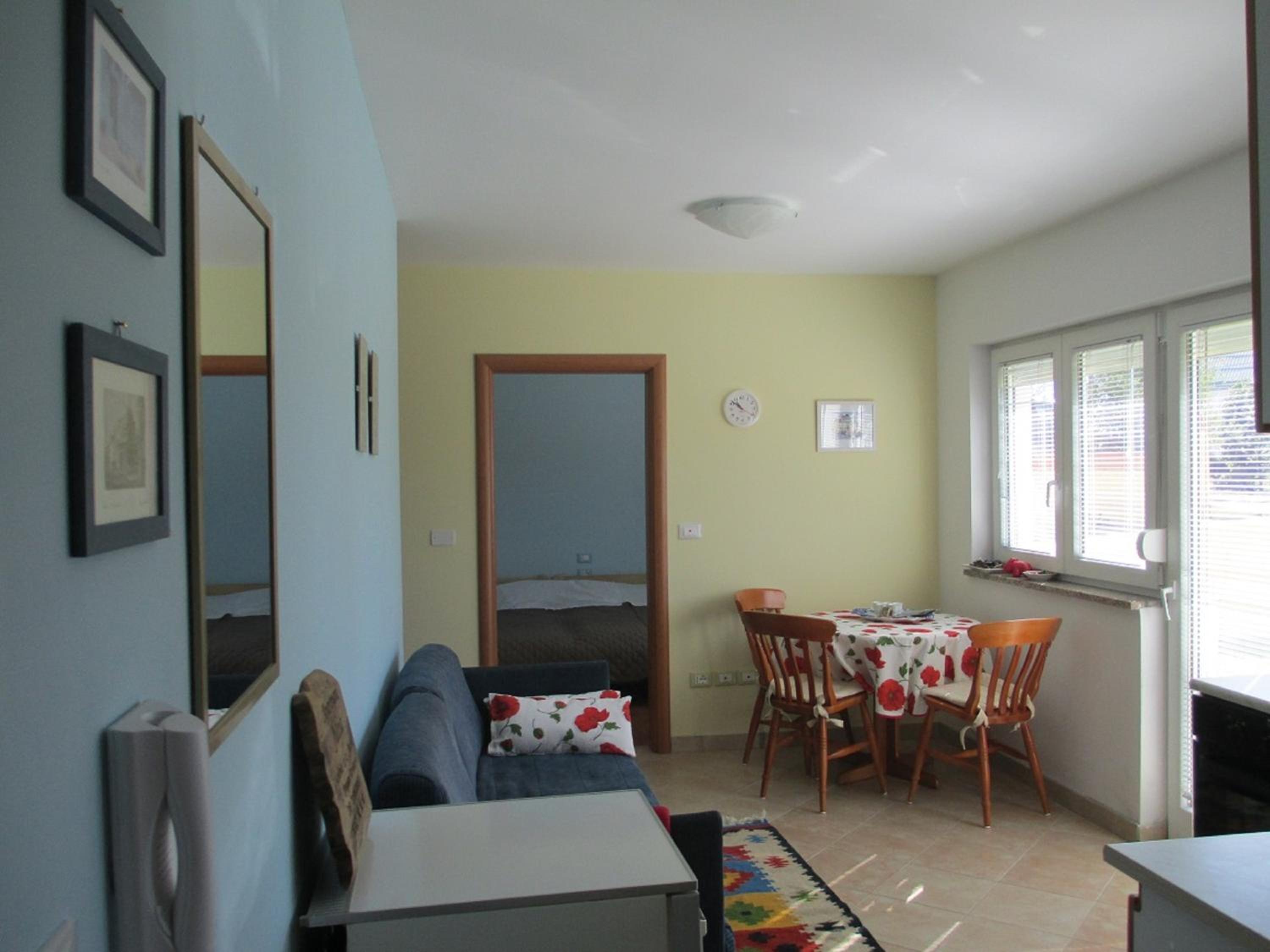 One-Bedroom Apartment with Terrace and Lake View