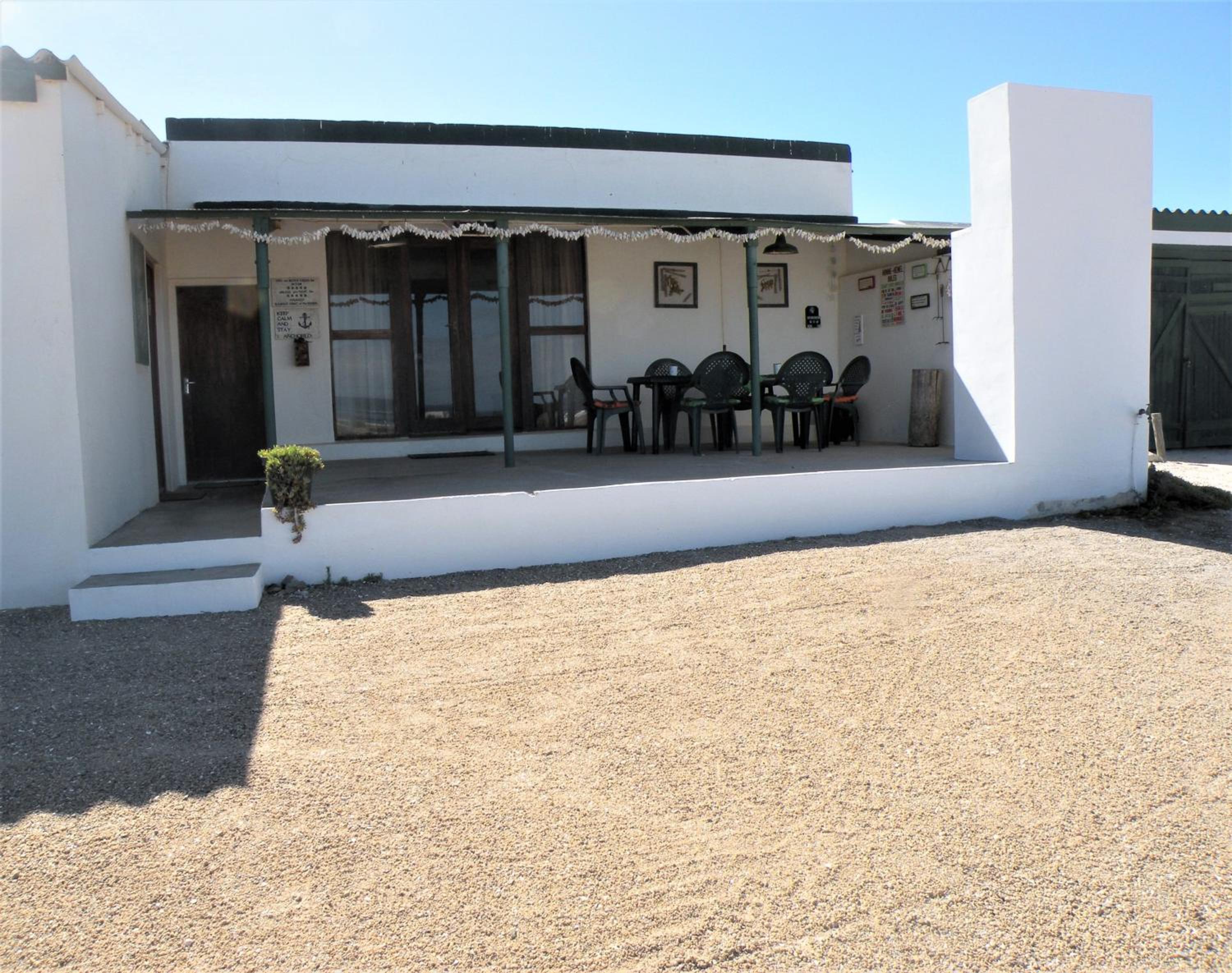 Three-Bedroom House - Photo 29