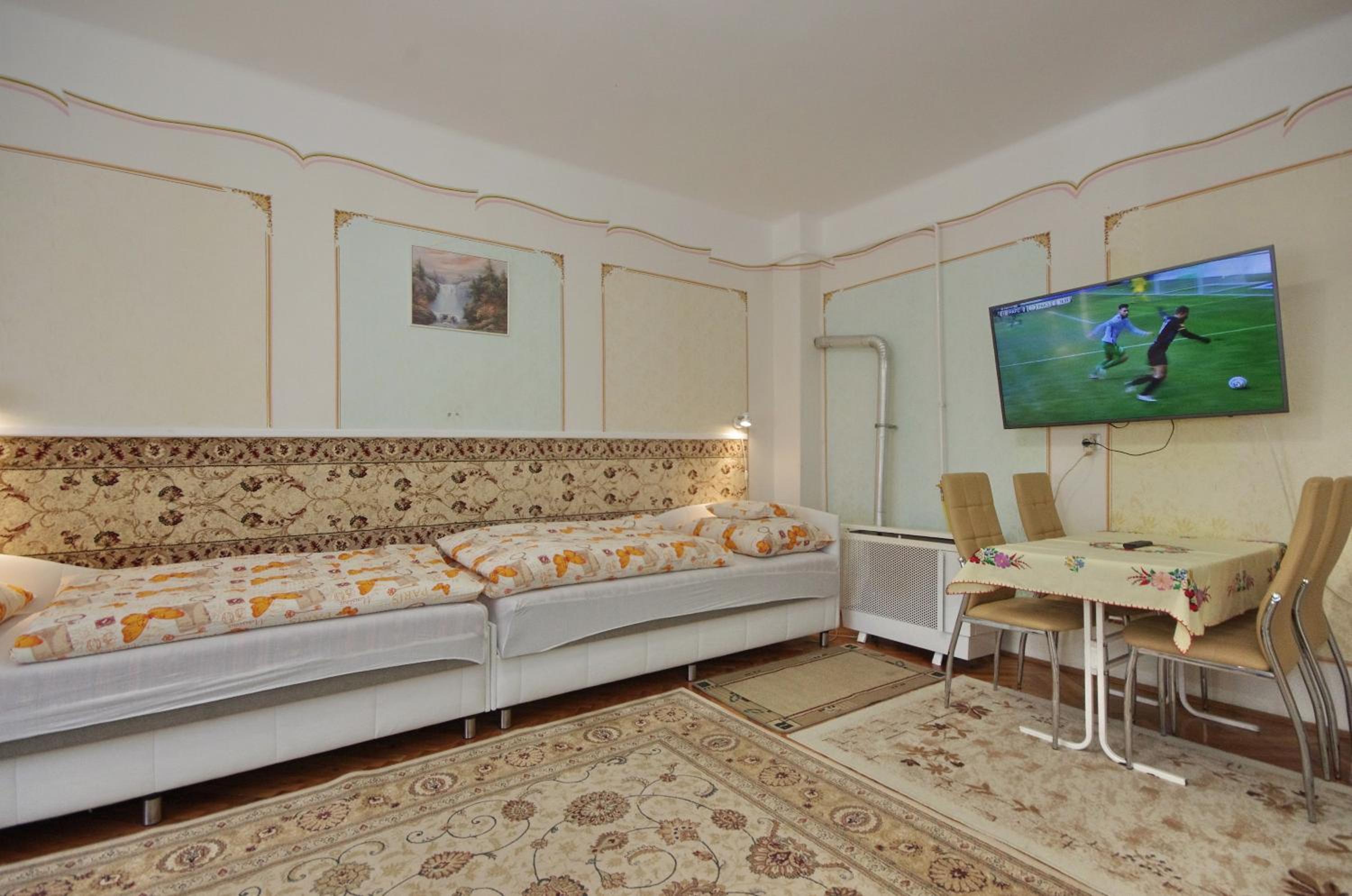 Three-Bedroom Apartment photo 1