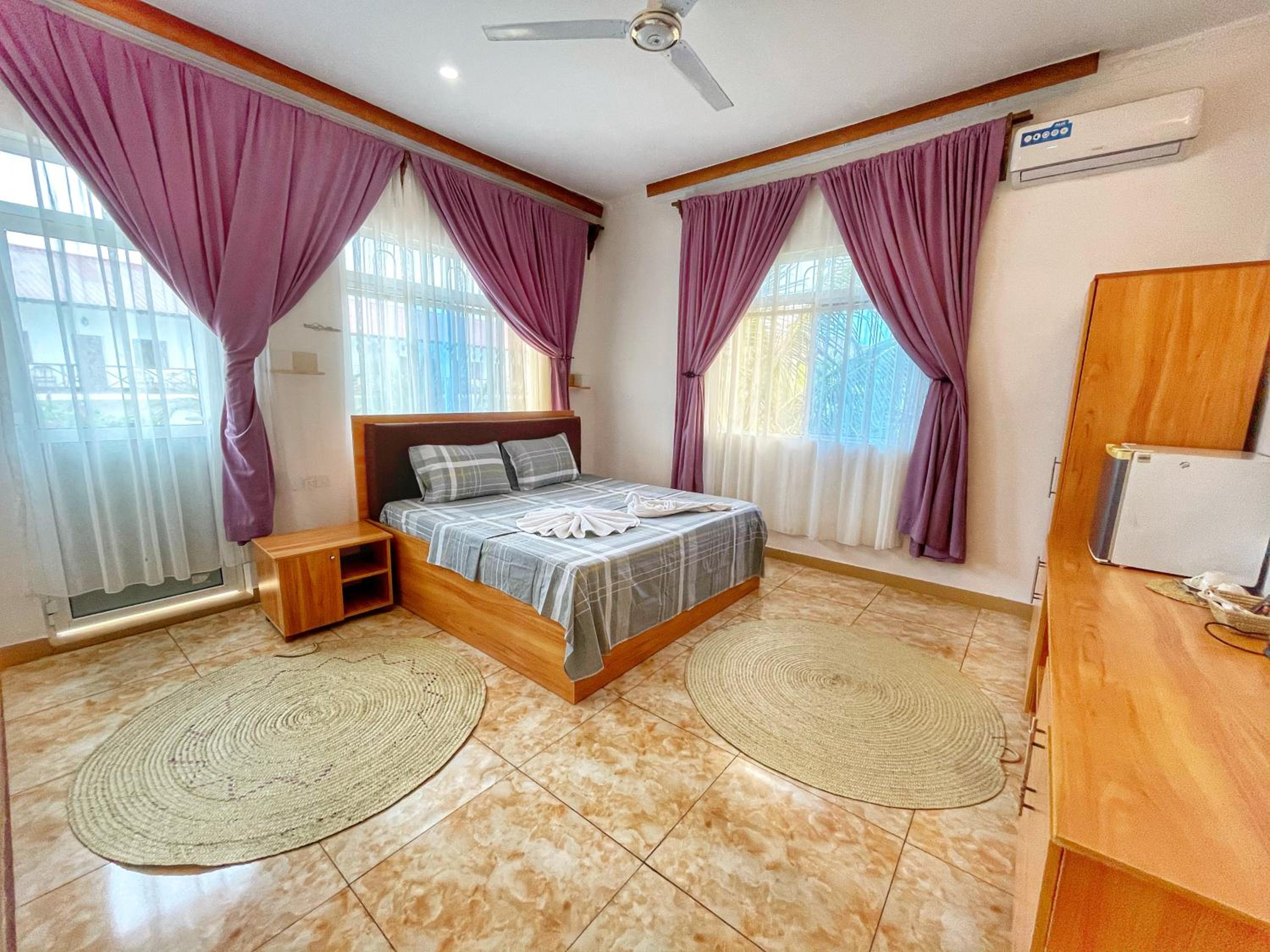 Deluxe Triple Room - Photo 2