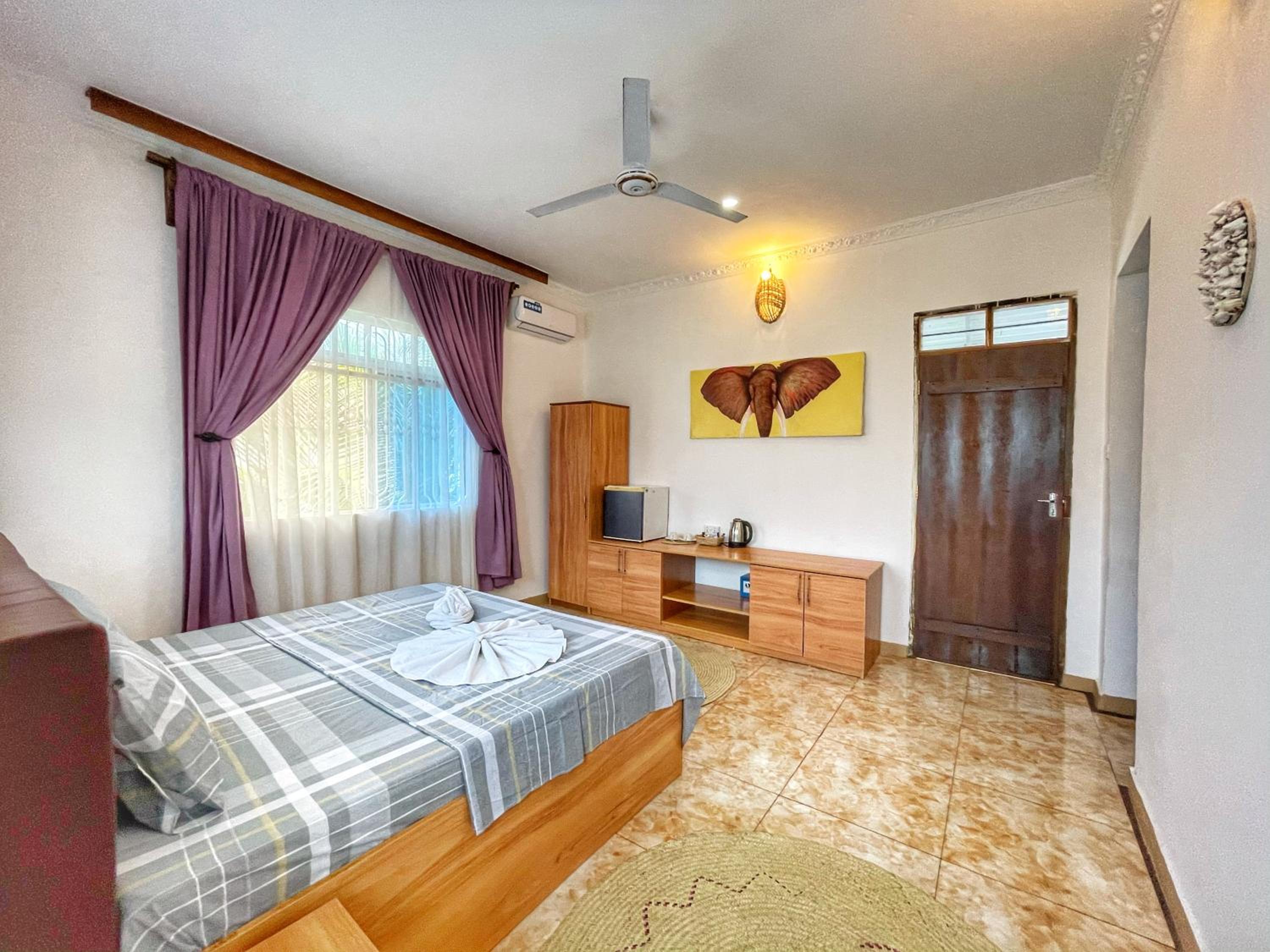 Deluxe Triple Room - Photo 1