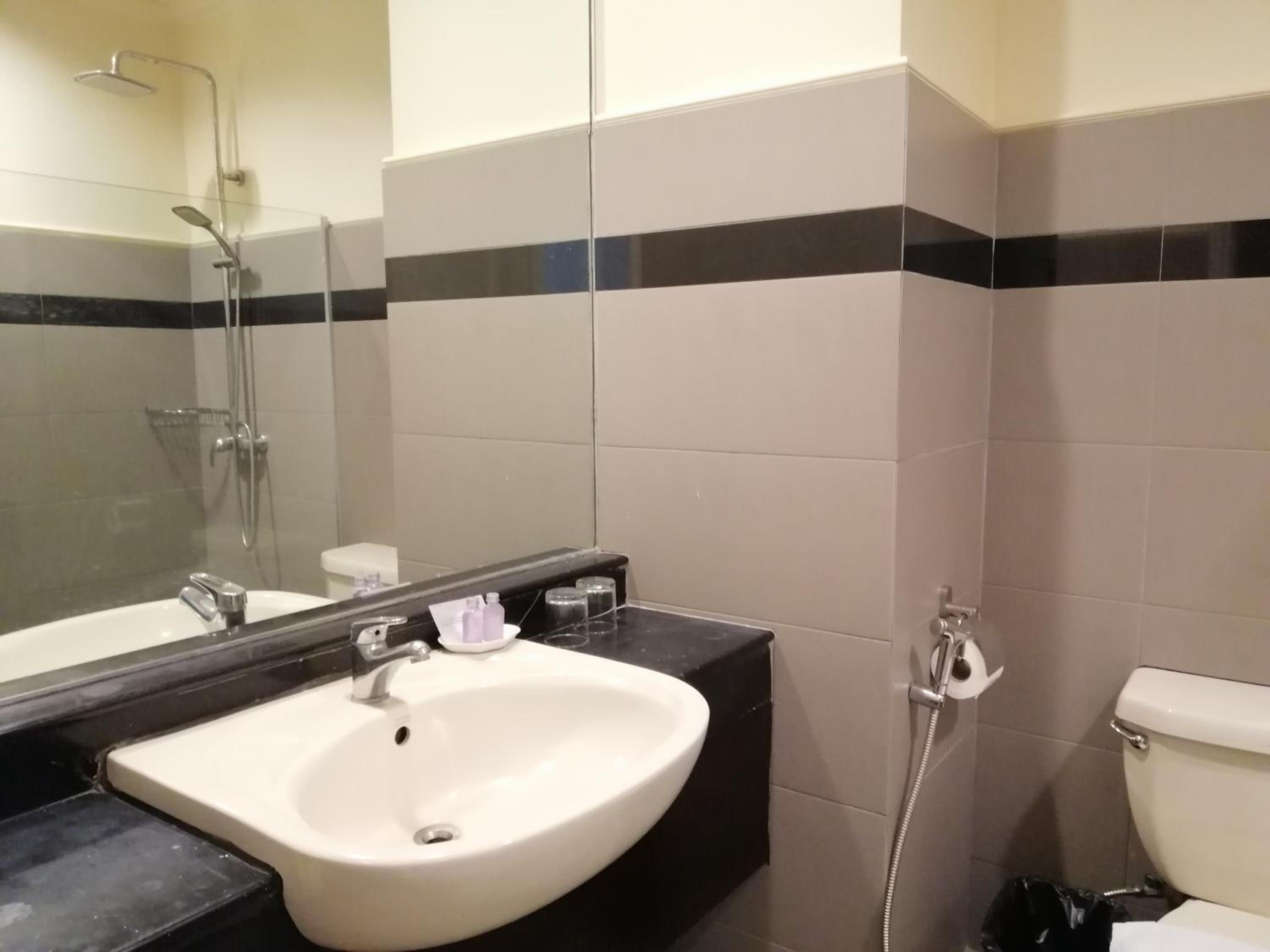 Three-Bedroom Apartment - Photo 14