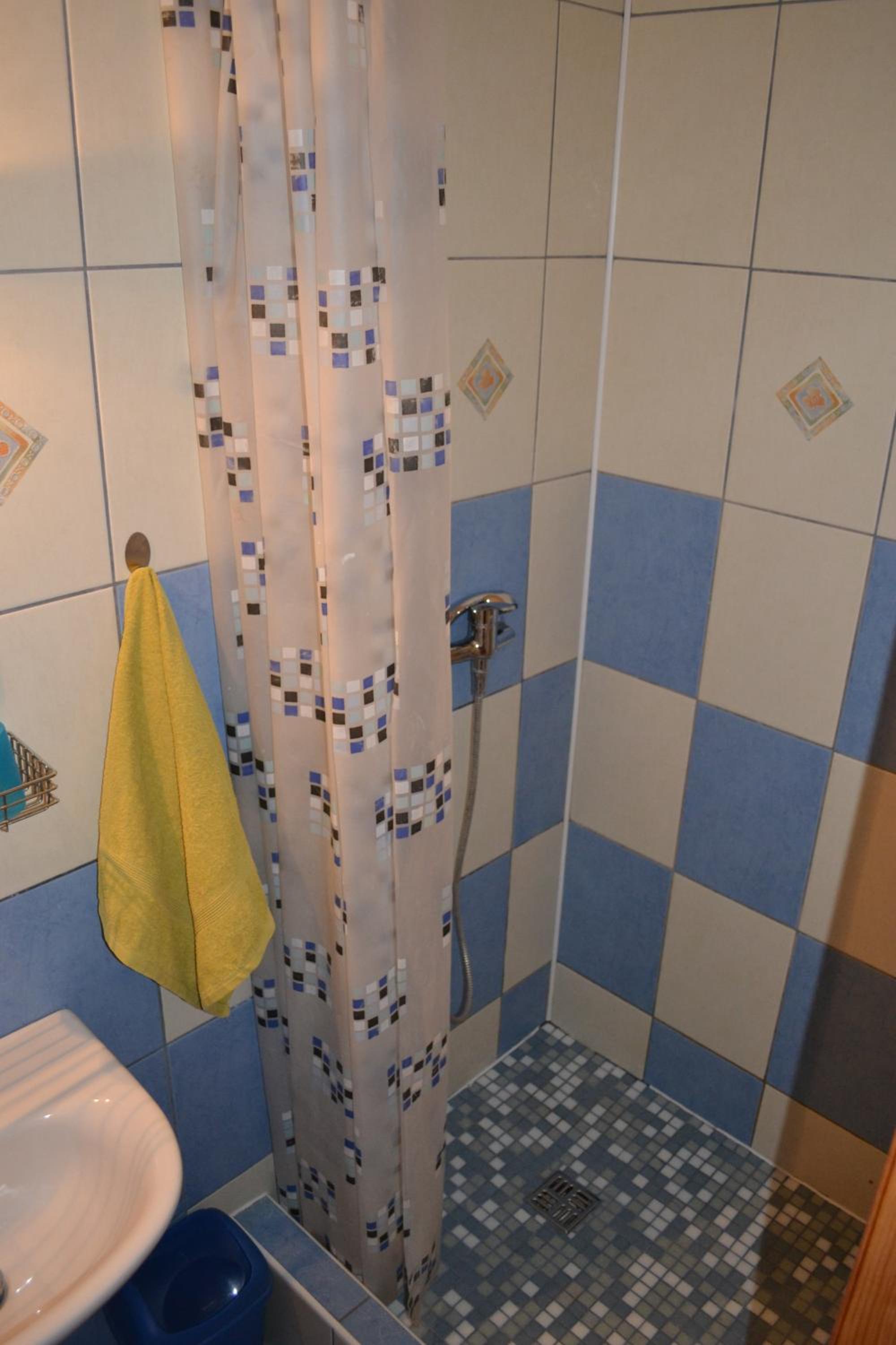 Three-Bedroom Apartment - Photo 10