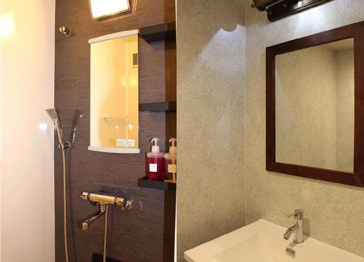 Standard Twin Room - Photo 16