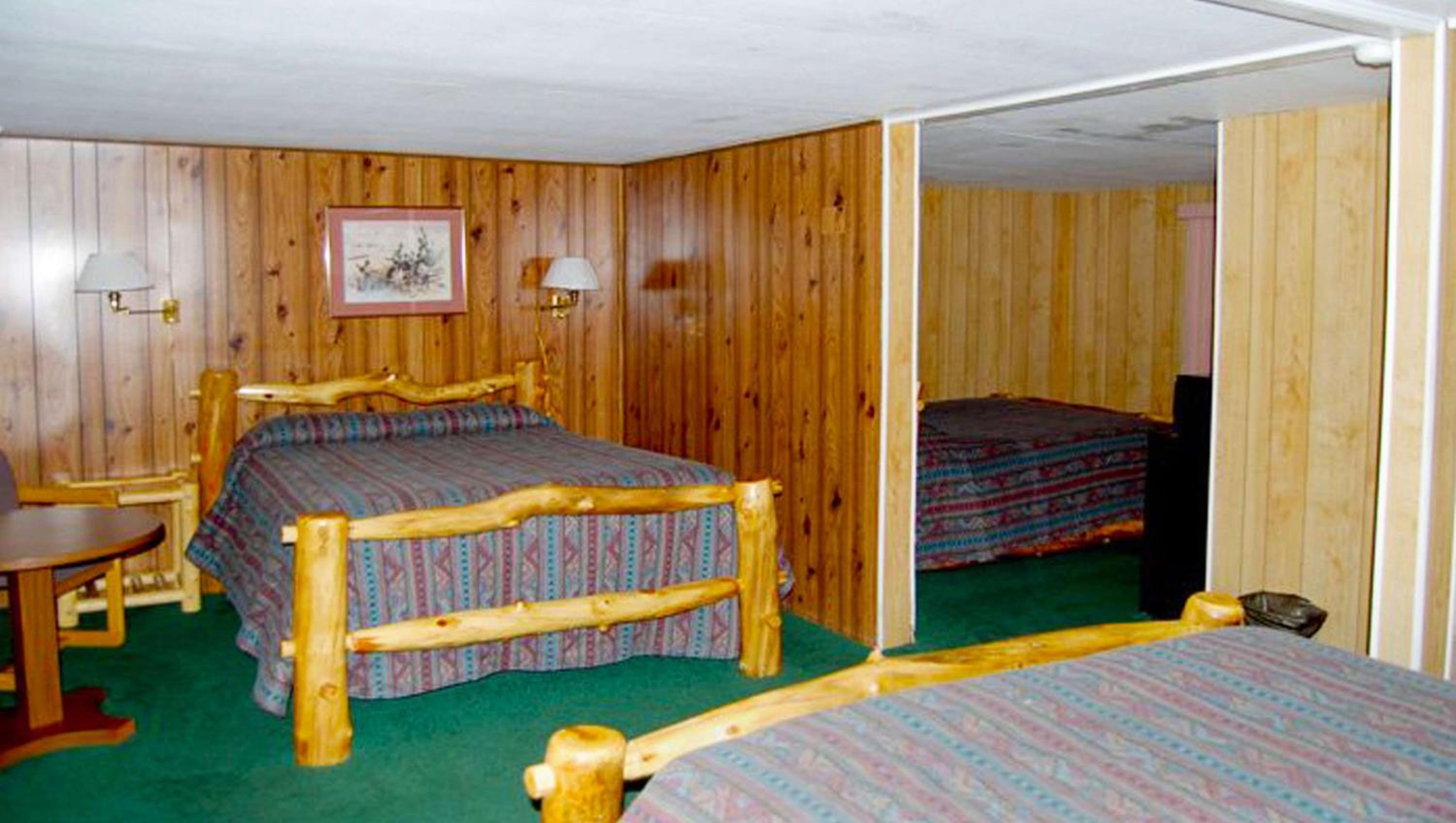 Queen Room with Four Queen Beds - Photo 1