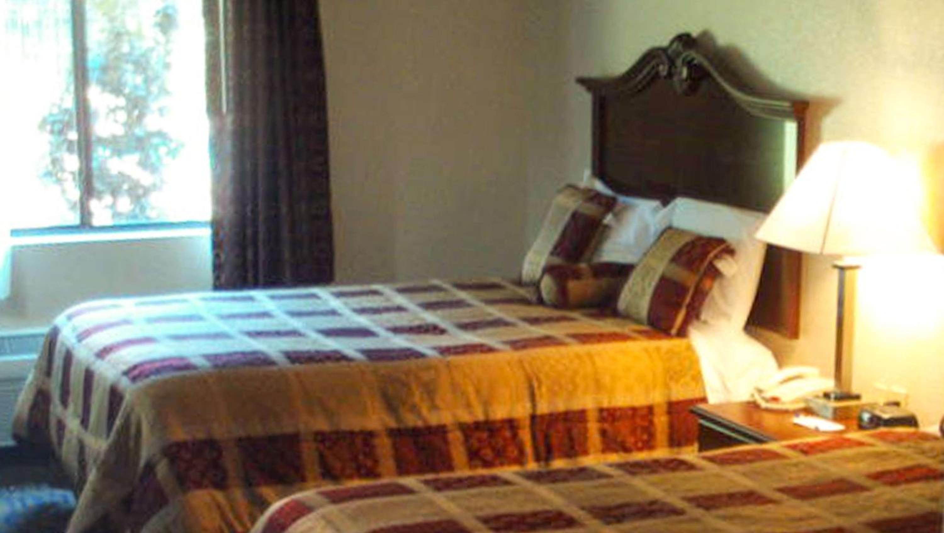 Queen Room with Two Queen Beds - Photo 1