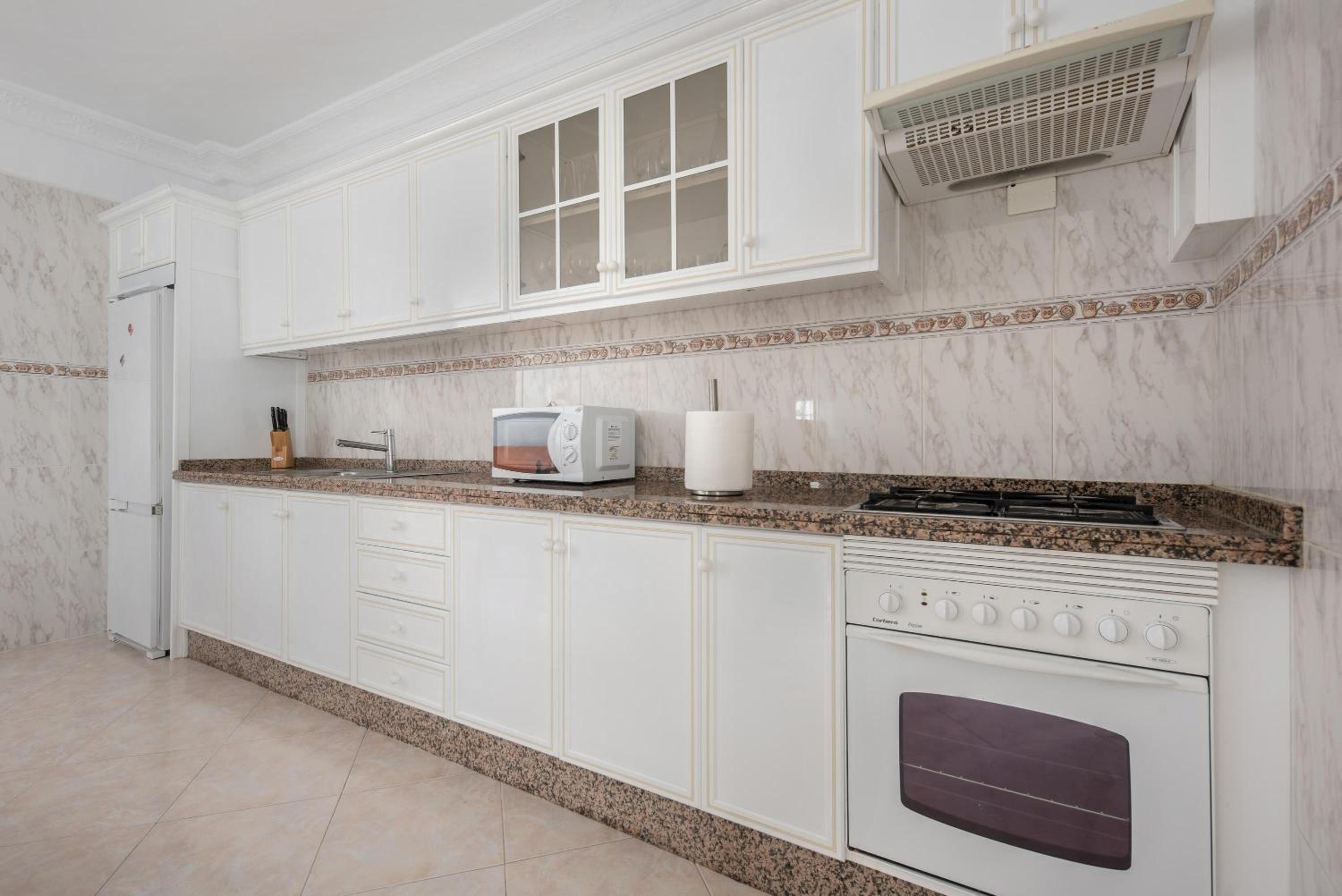Three-Bedroom House - Photo 15