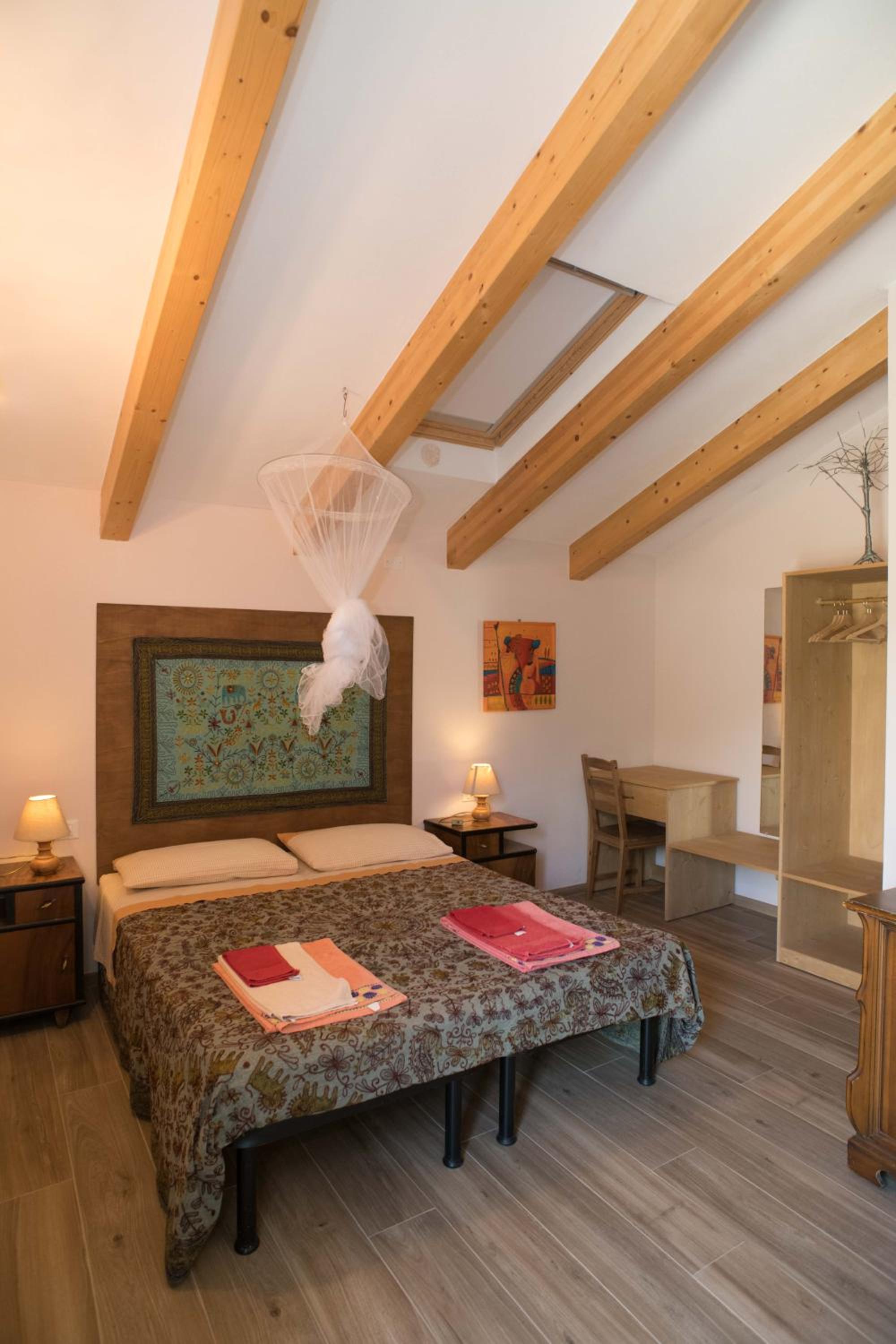 Quadruple Room with Private Bathroom