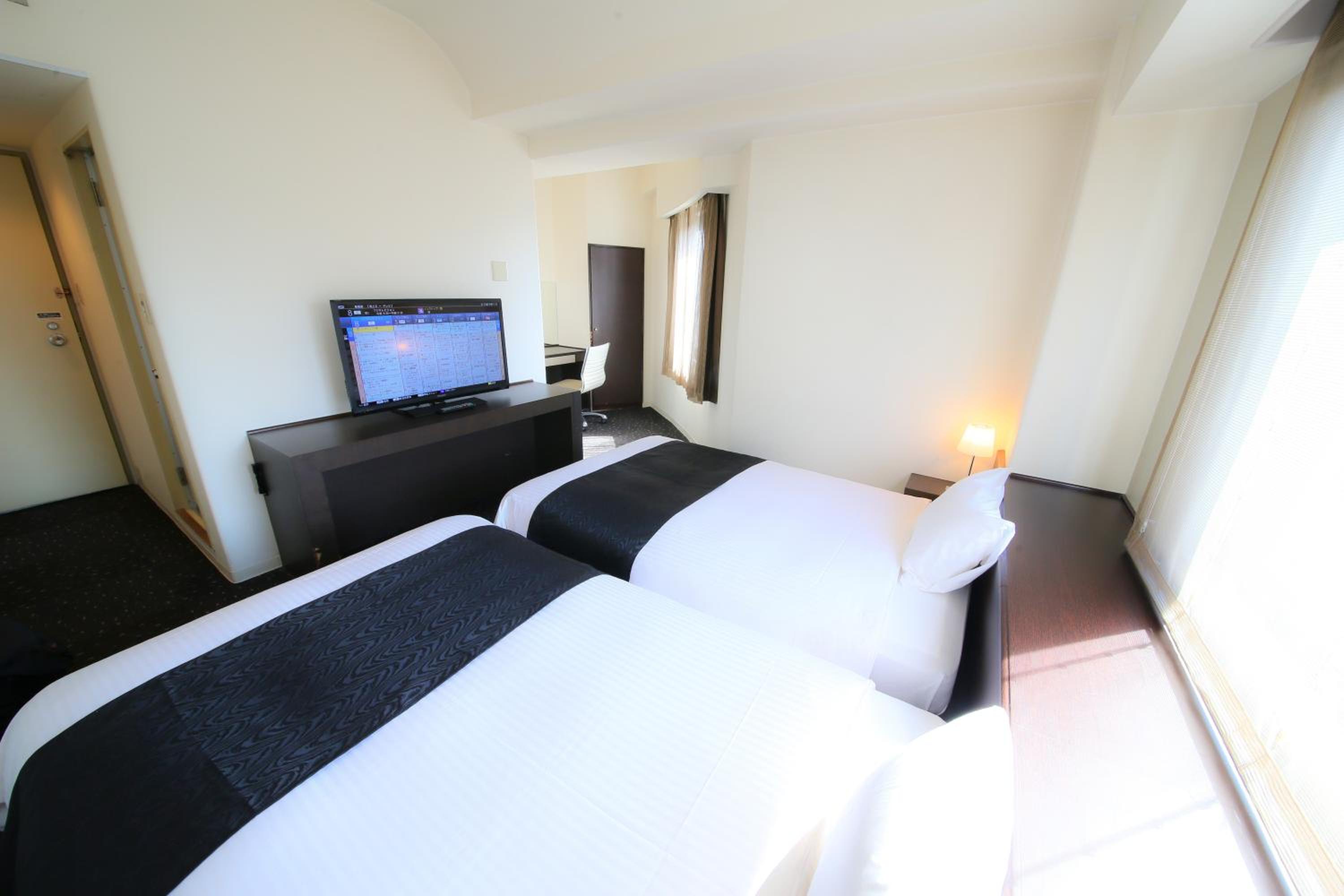 Twin Room - Non-Smoking photo 1