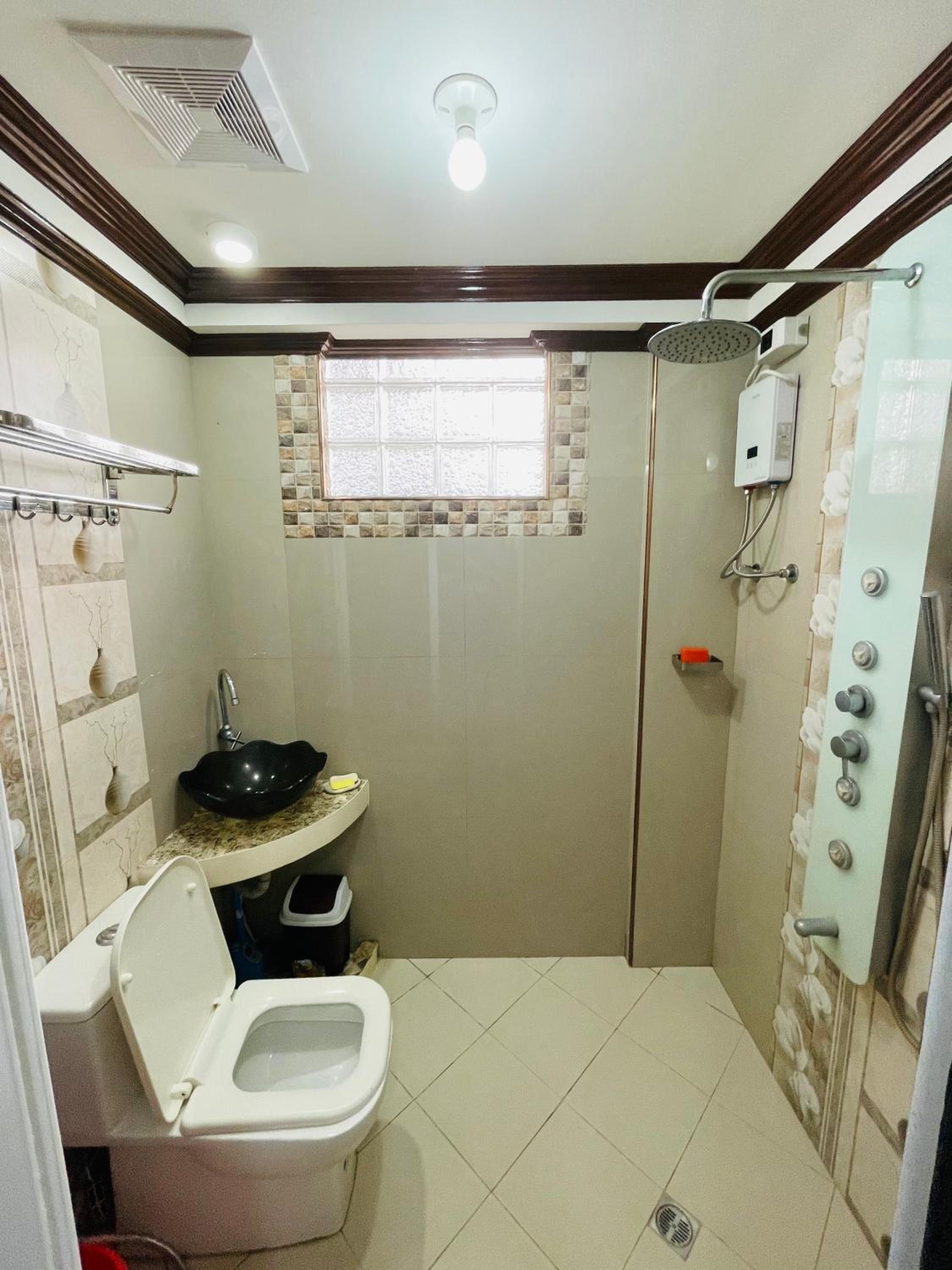 Three-Bedroom House - Photo 41