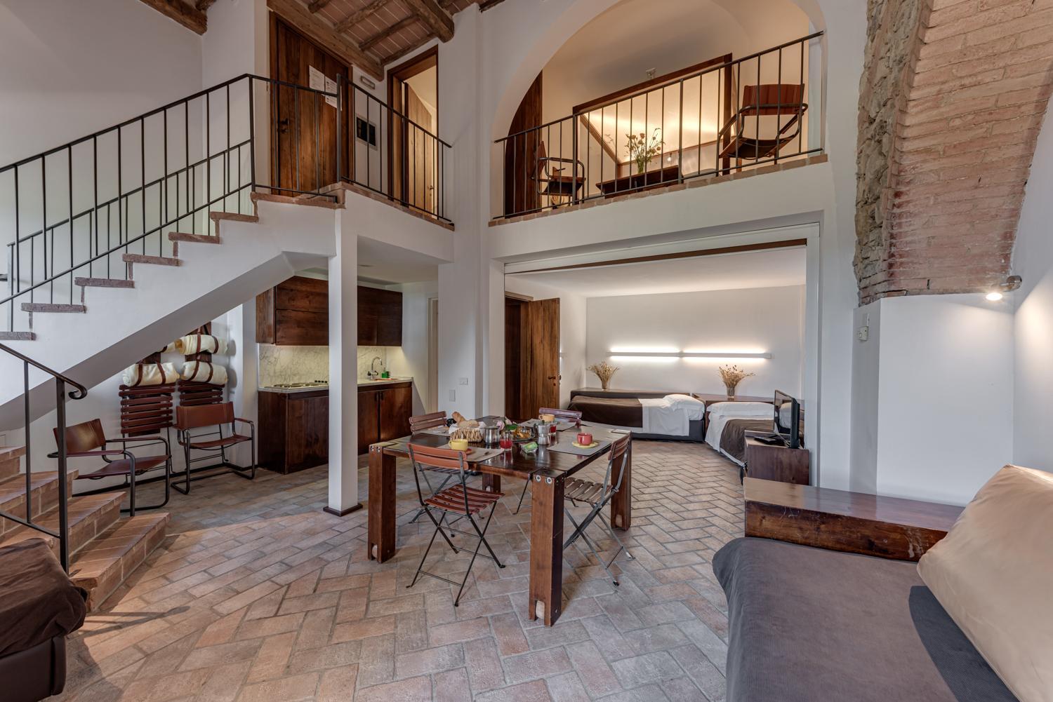 One-Bedroom Apartment with Terrace and Mezzanine - Split Level photo 1
