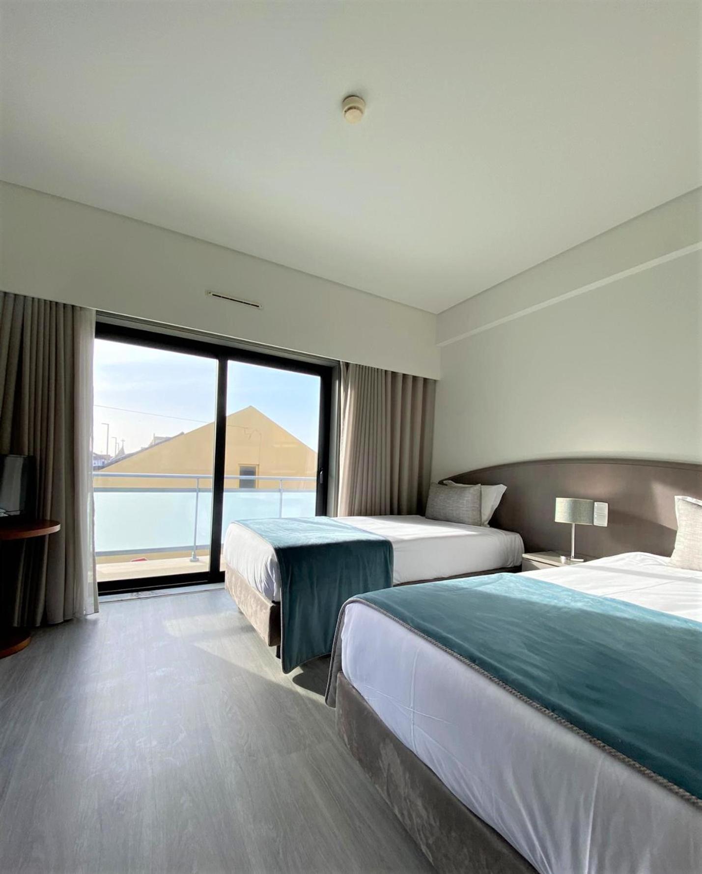 Twin Room with Balcony - Photo 1