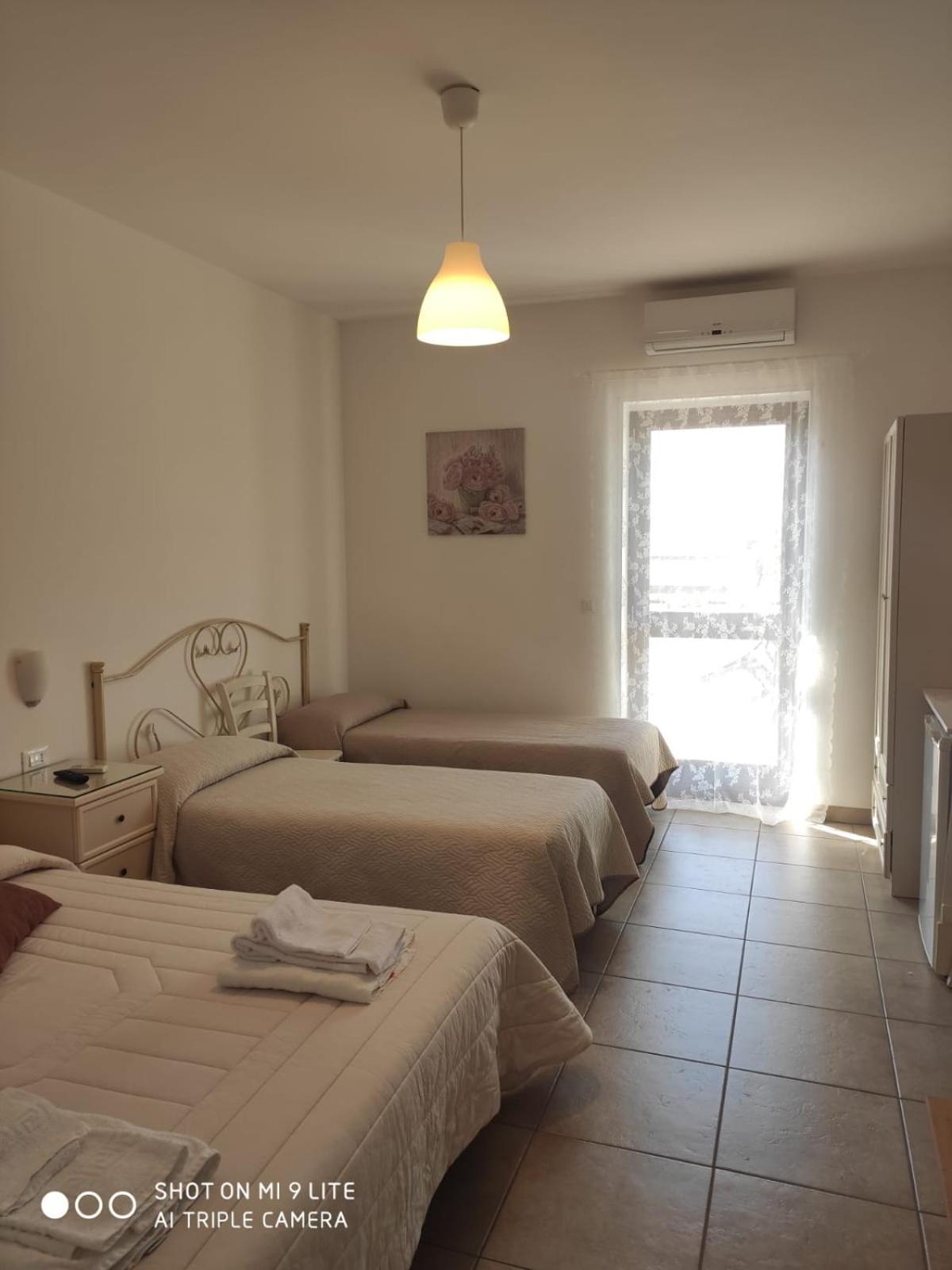Quadruple Room with Balcony photo 2