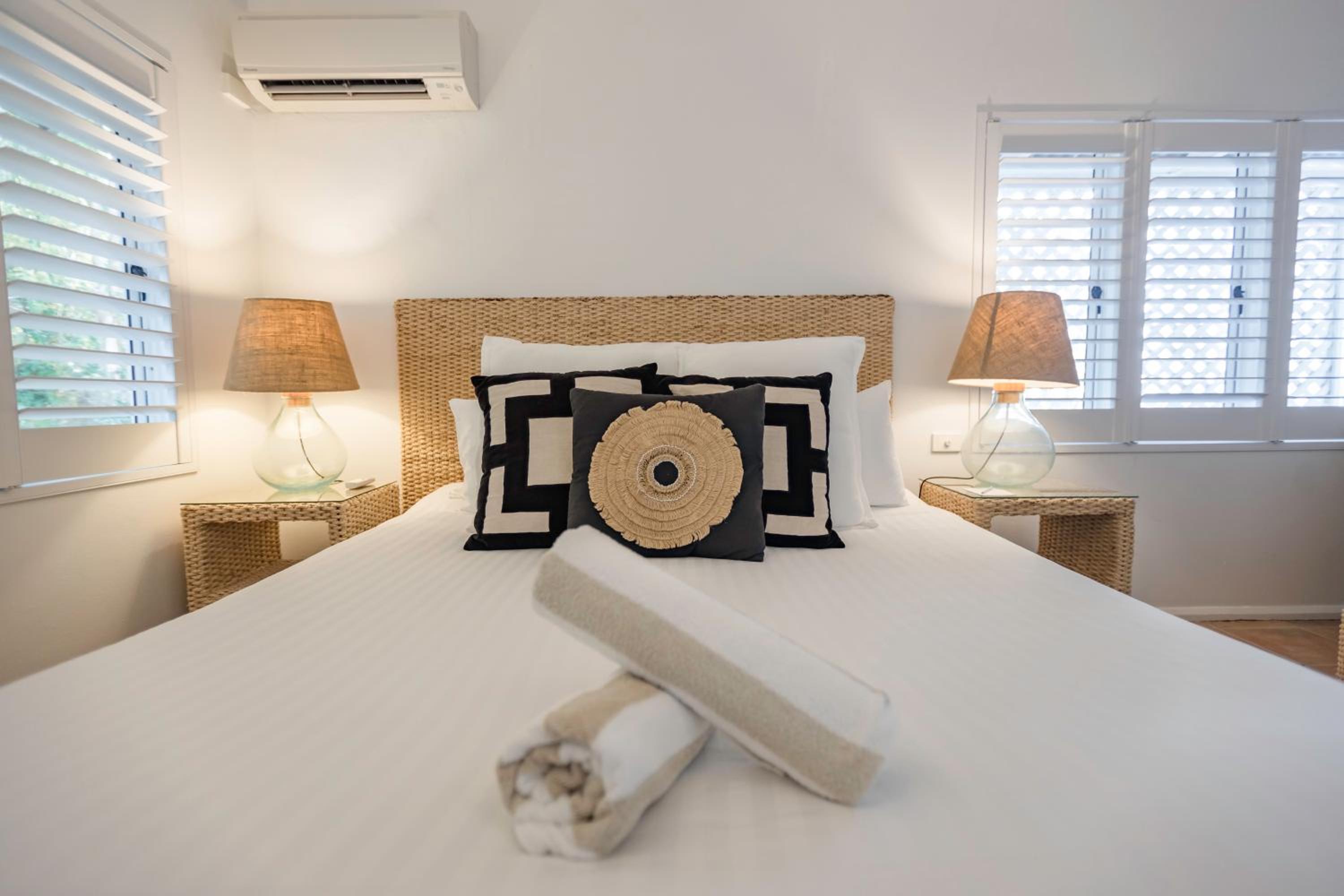 Two-Bedroom and One-Bathroom Apartment with Tropical Garden Patio, Spacious Living and SPA Bath