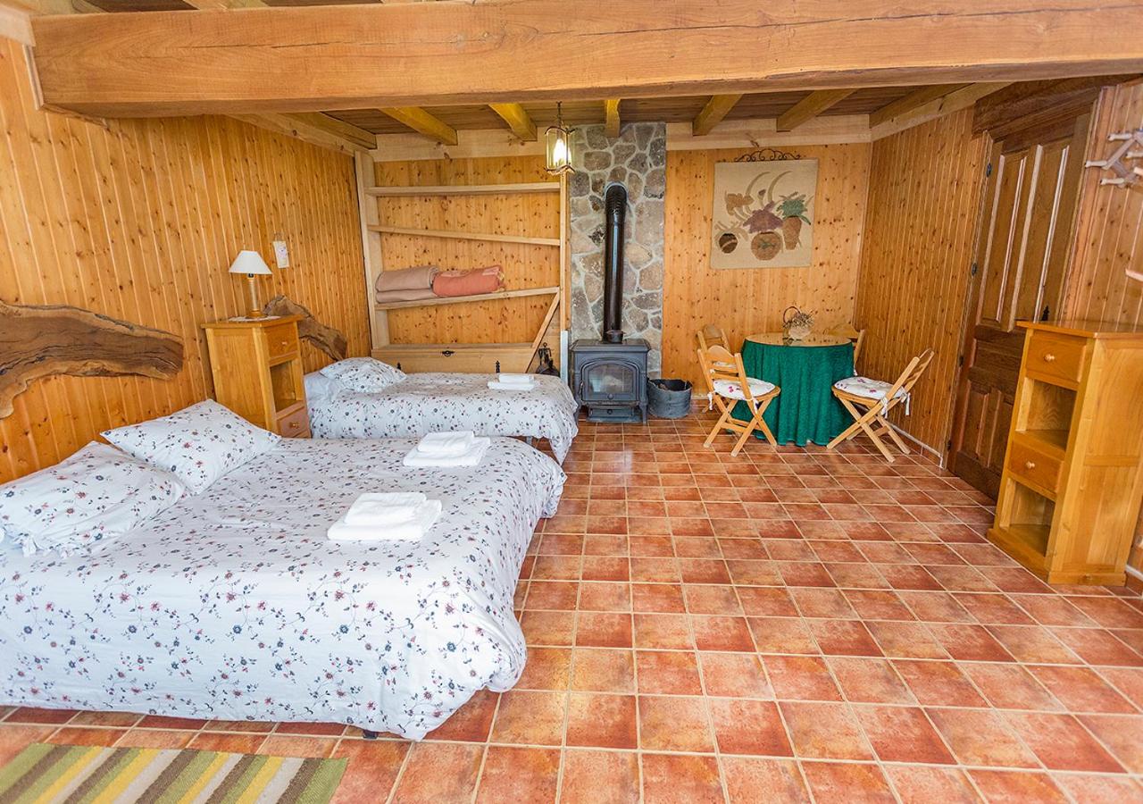 Habitación Cuádruple con Vista al Jardín