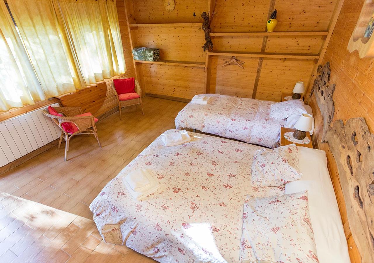 Habitación Cuádruple con Vista al Jardín