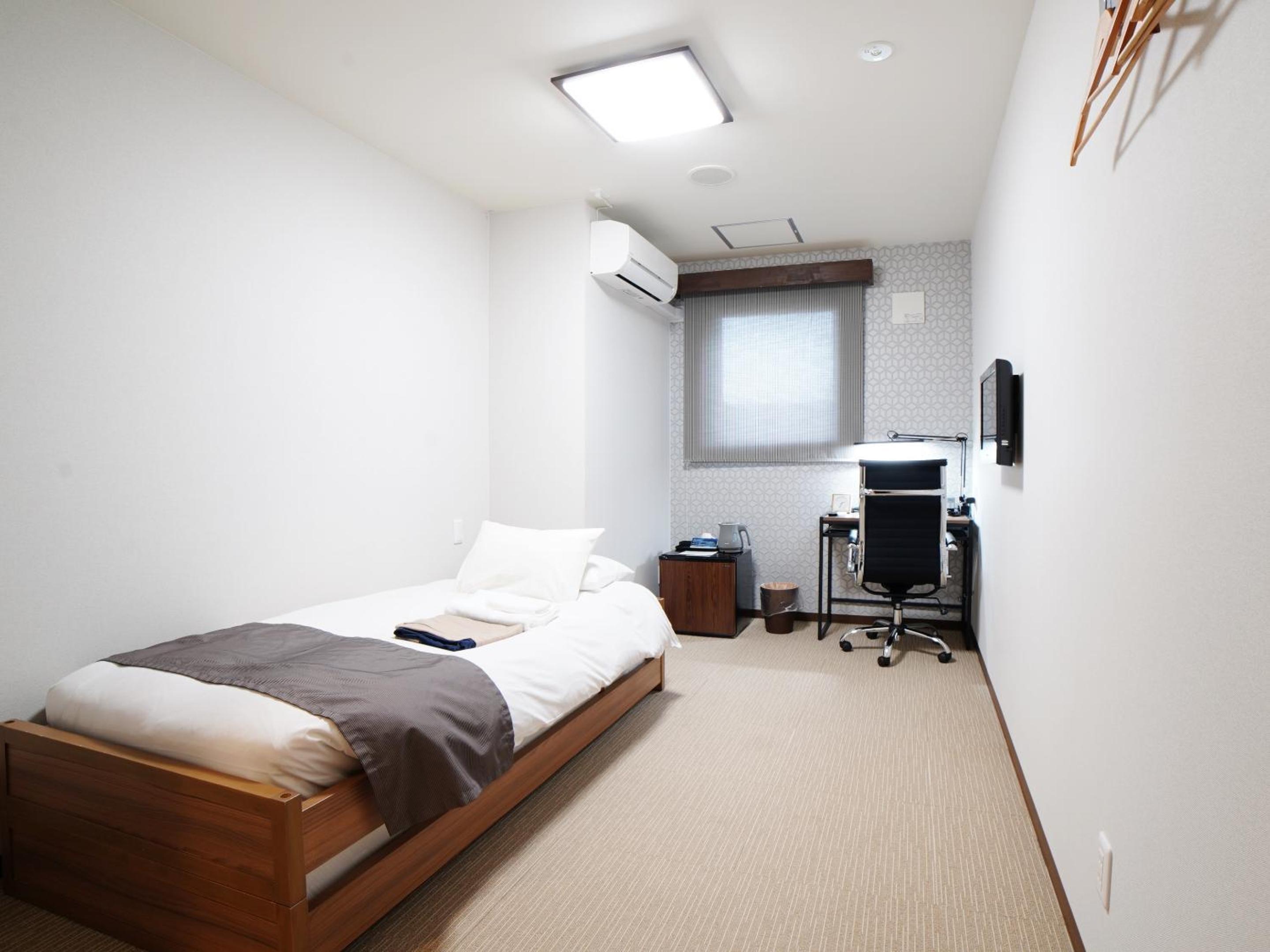 Single Room with Shared Bathroom
