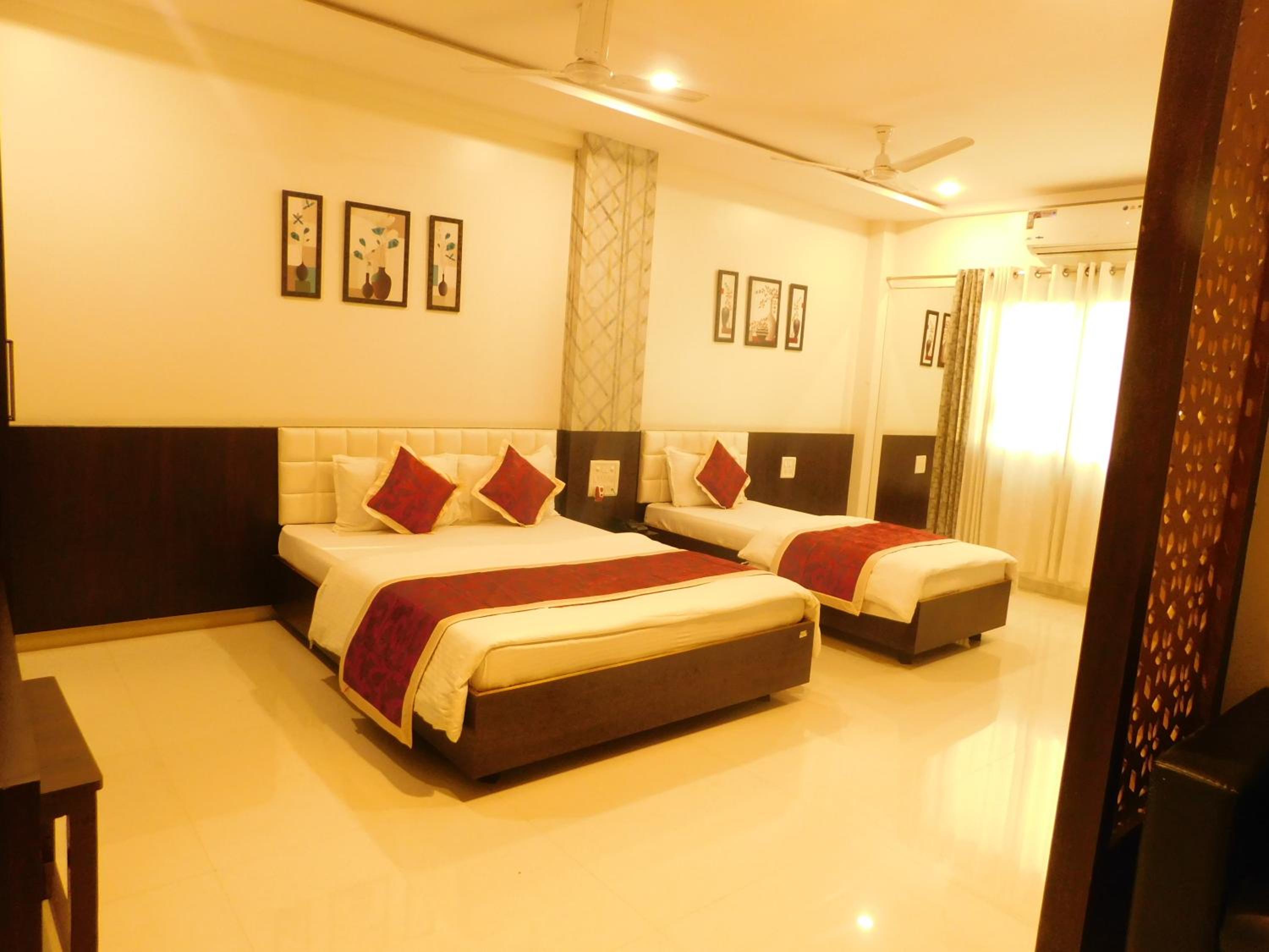 Deluxe Triple Room - Photo 23