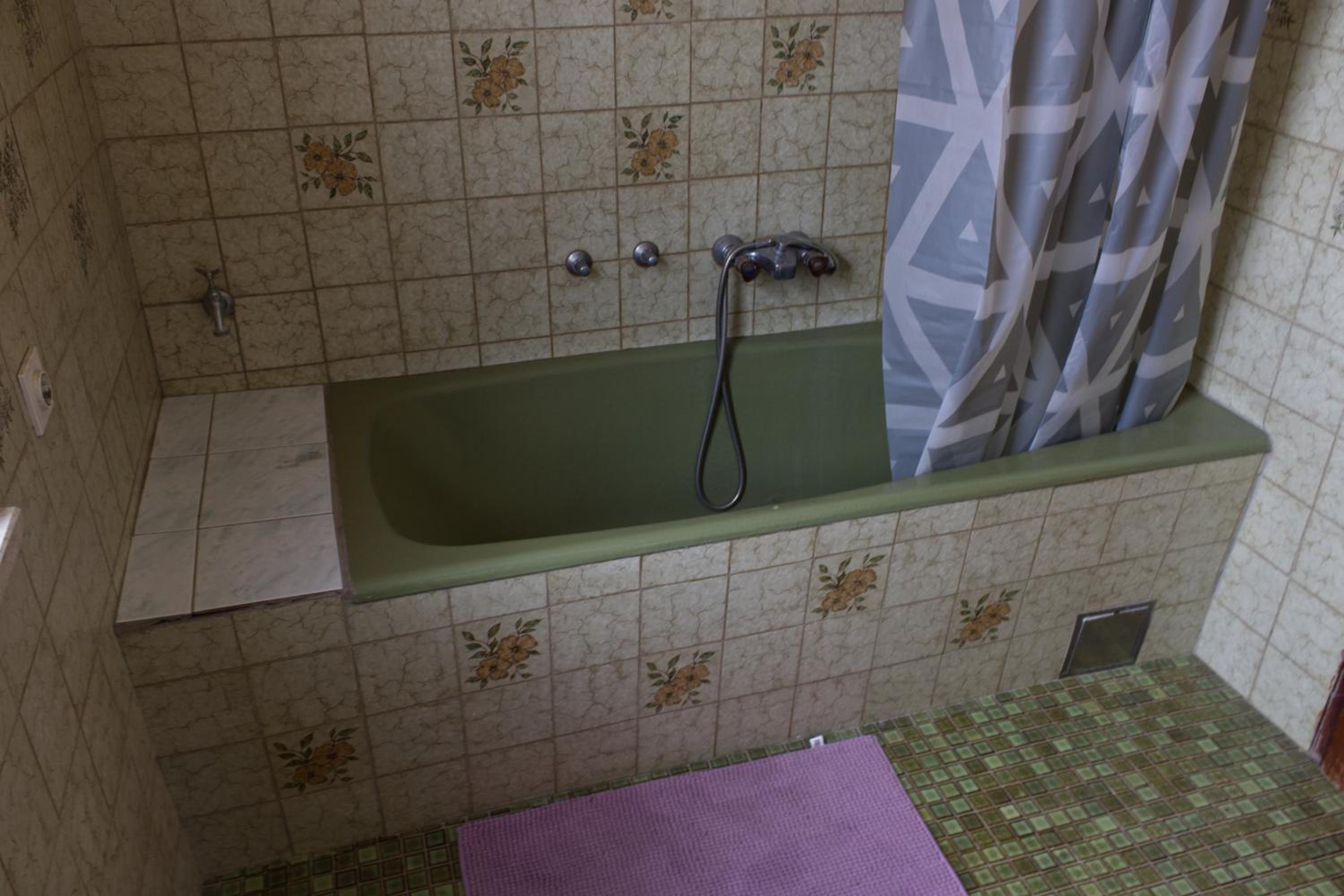 Three-Bedroom Apartment - Photo 43