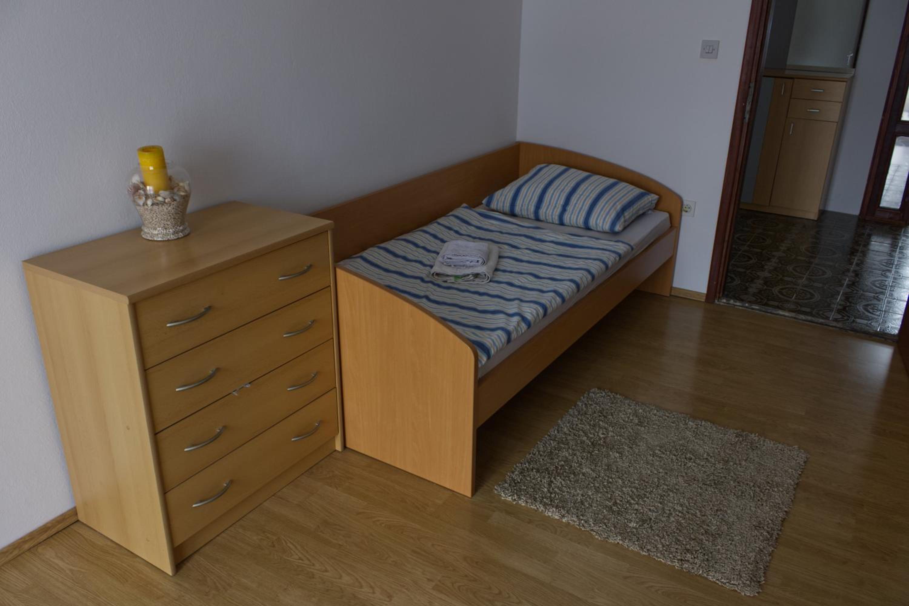 Three-Bedroom Apartment - Photo 15