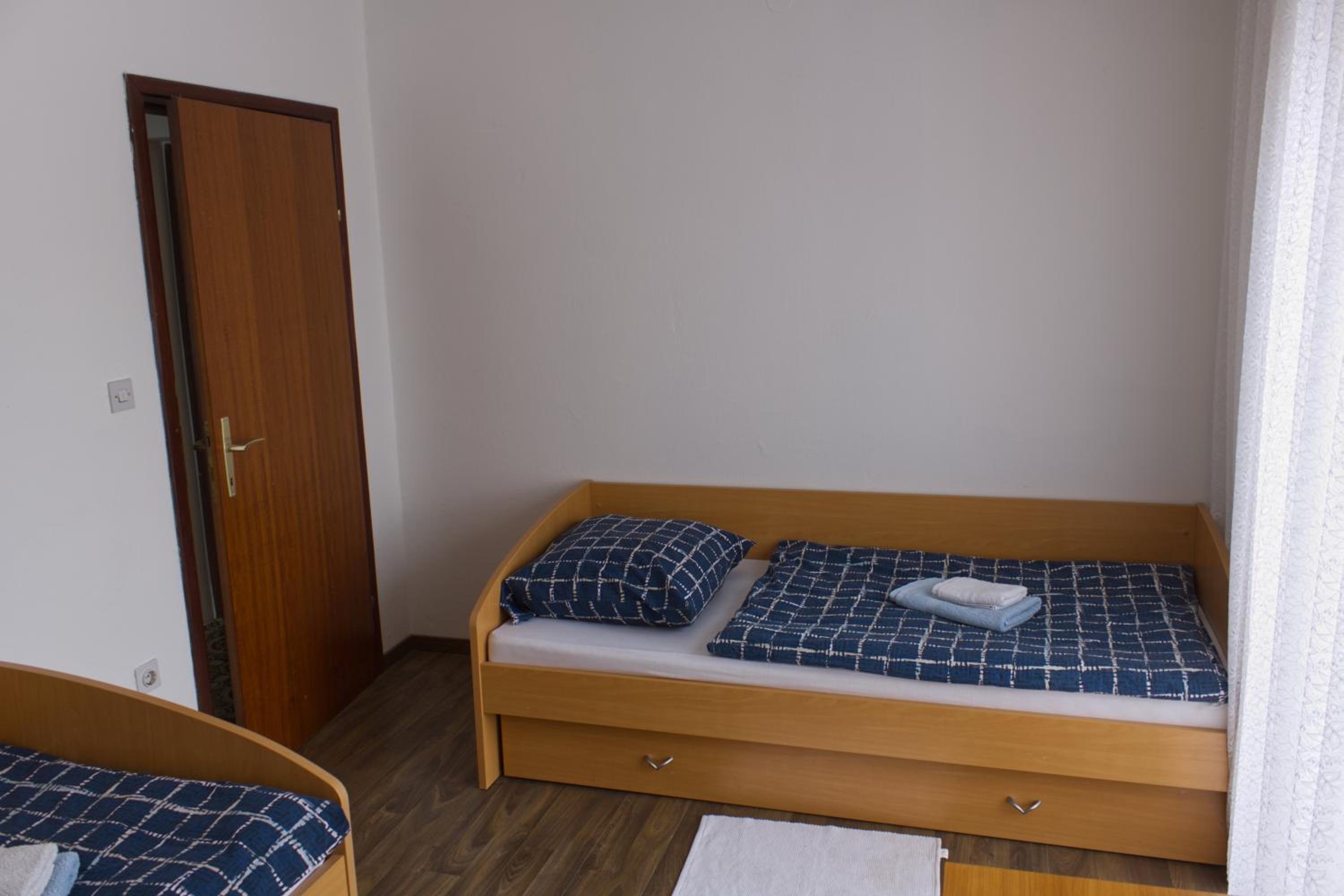 Three-Bedroom Apartment - Photo 18